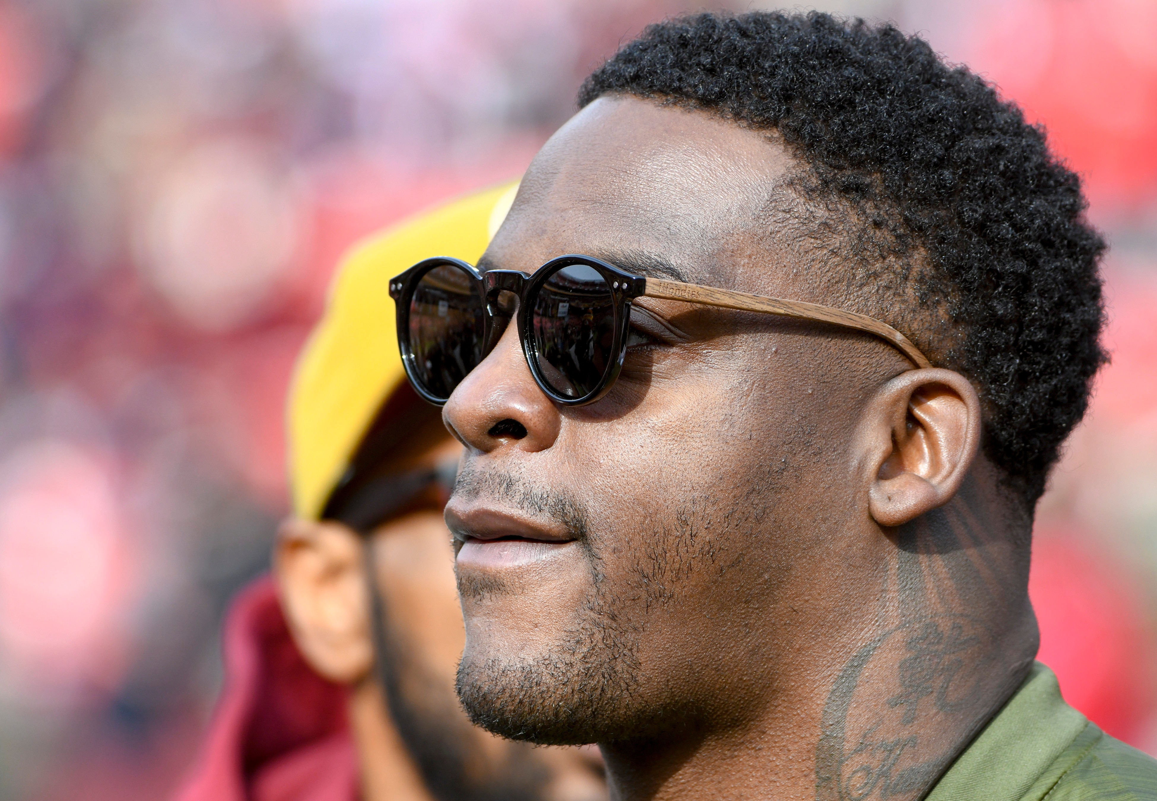 LANDOVER, MD - NOVEMBER 18:  Former Washington Redskins running back Clinton Portis smiles during a Redskins recognition ceremony prior to the game on November 18, 2018, at FedEx Field in Landover, MD. (Photo by Mark Goldman/Icon Sportswire via Getty Images)
