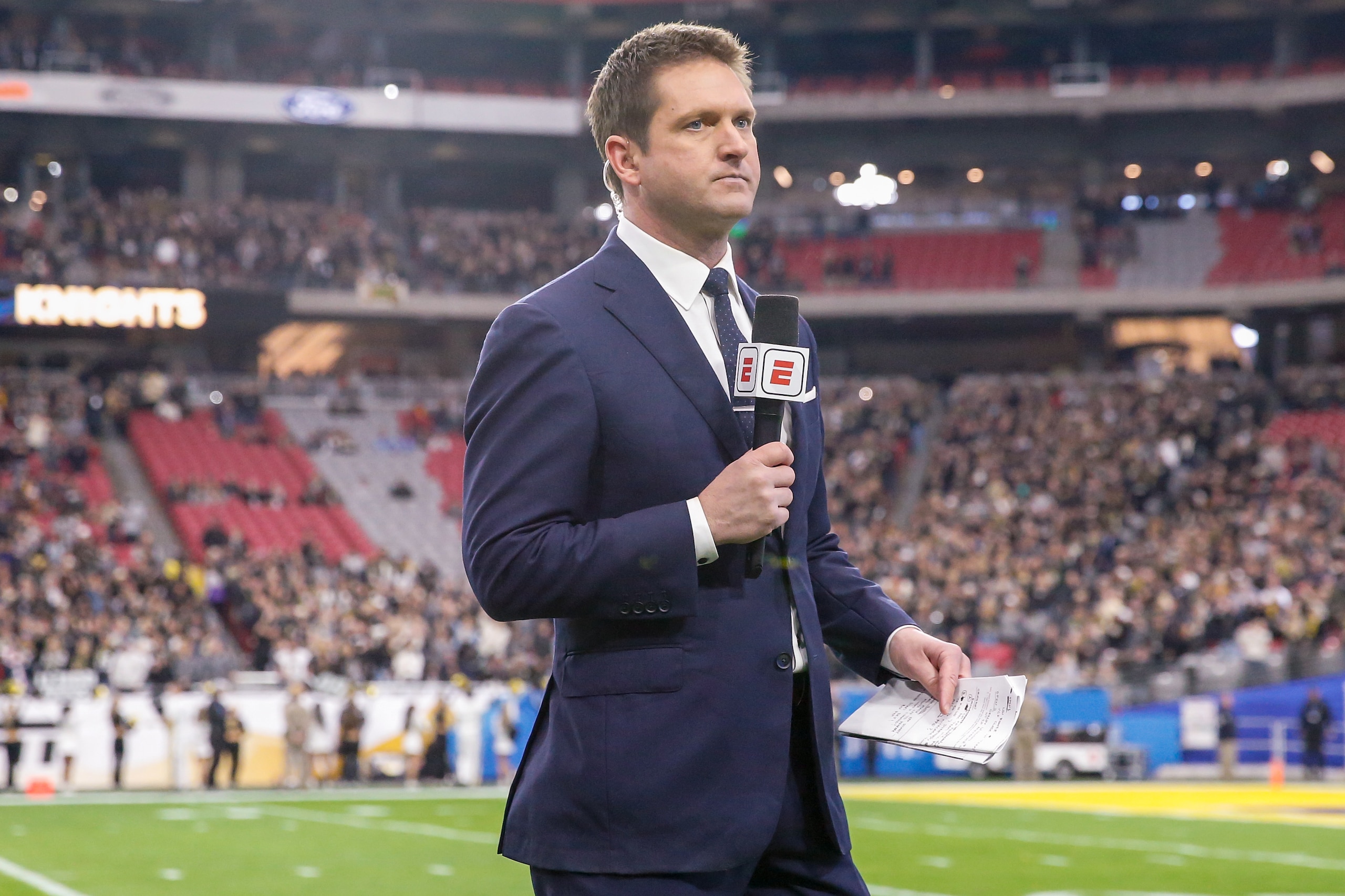 GLENDALE, AZ - JANUARY 01: ESPN sideline reporter Todd McShay reports before the college football game between the UCF Knights and the LSU Tigers on January 1, 2019 at State Farm Stadium in Glendale, Arizona. (Photo by Kevin Abele/Icon Sportswire via Getty Images)