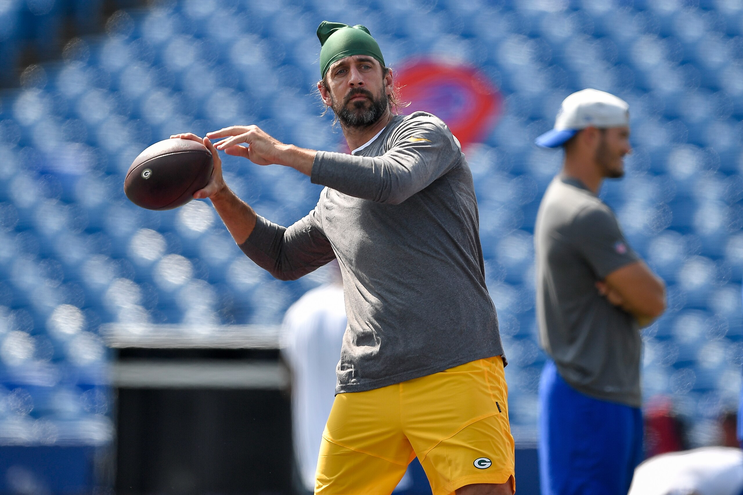 Green Bay Packers quarterback Aaron Rodgers warms up before a preseason NFL football game against the Buffalo Bills in Orchard Park, N.Y., Saturday, Aug. 28, 2021. (AP Photo/Adrian Kraus)