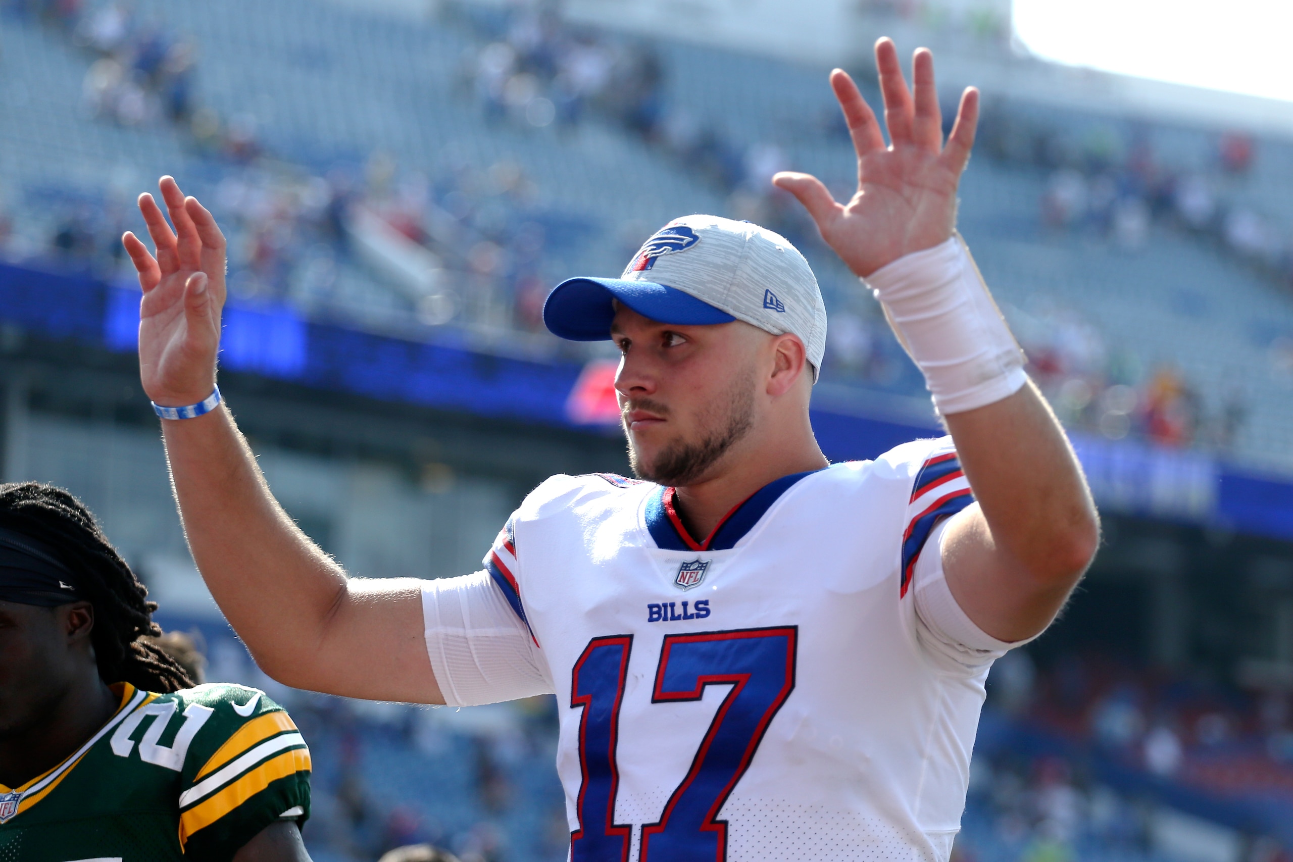 Buffalo Bills quarterback Josh Allen (17) thanks fans after the second half of a preseason NFL football game, Saturday, Aug. 28, 2021, in Orchard Park, N.Y. (AP Photo/Joshua Bessex)