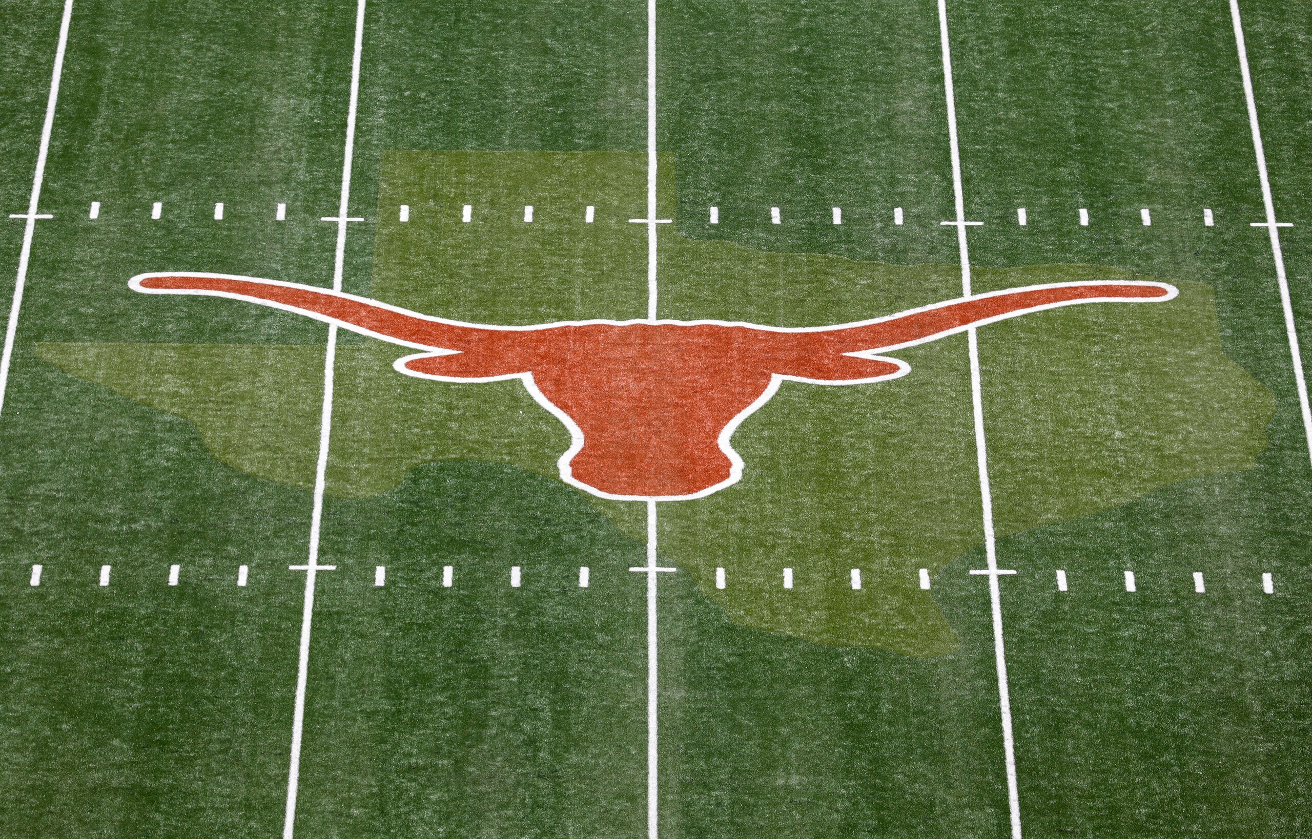 AUSTIN, TEXAS - SEPTEMBER 04: A view of the Texas Longhorns logo at midfield before the game between the Texas Longhorns and the Louisiana Ragin' Cajuns at Darrell K Royal-Texas Memorial Stadium on September 04, 2021 in Austin, Texas. (Photo by Tim Warner/Getty Images)