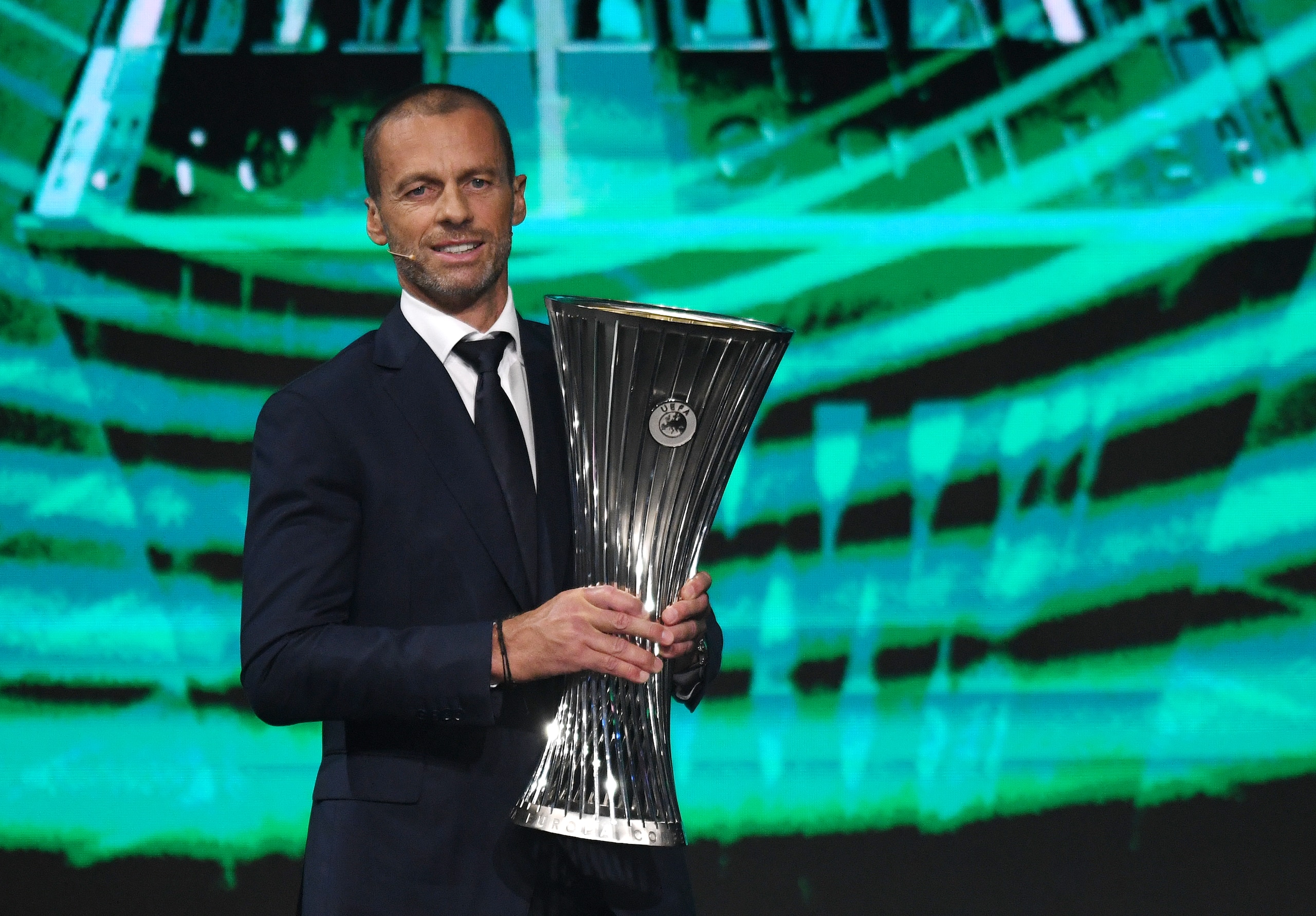 ISTANBUL, TURKEY - AUGUST 27: Aleksander Ceferin, President of UEFA holds the UEFA Europa Conference League trophy during the UEFA Europa Conference League 2021/22 Group Stage Draw on August 27, 2021 in Istanbul, Turkey. (Photo by Burak Kara - UEFA/UEFA via Getty Images)