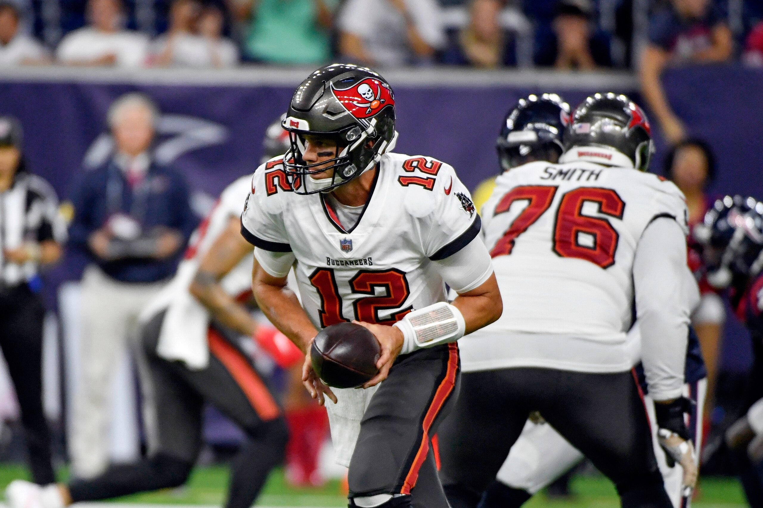 FILE - In this Saturday, Aug. 28, 2021, file photo, Tampa Bay Buccaneers quarterback Tom Brady (12) hands off the ball during the first half of a preseason NFL football game against the Houston Texans in Houston. (AP Photo/Justin Rex, File)