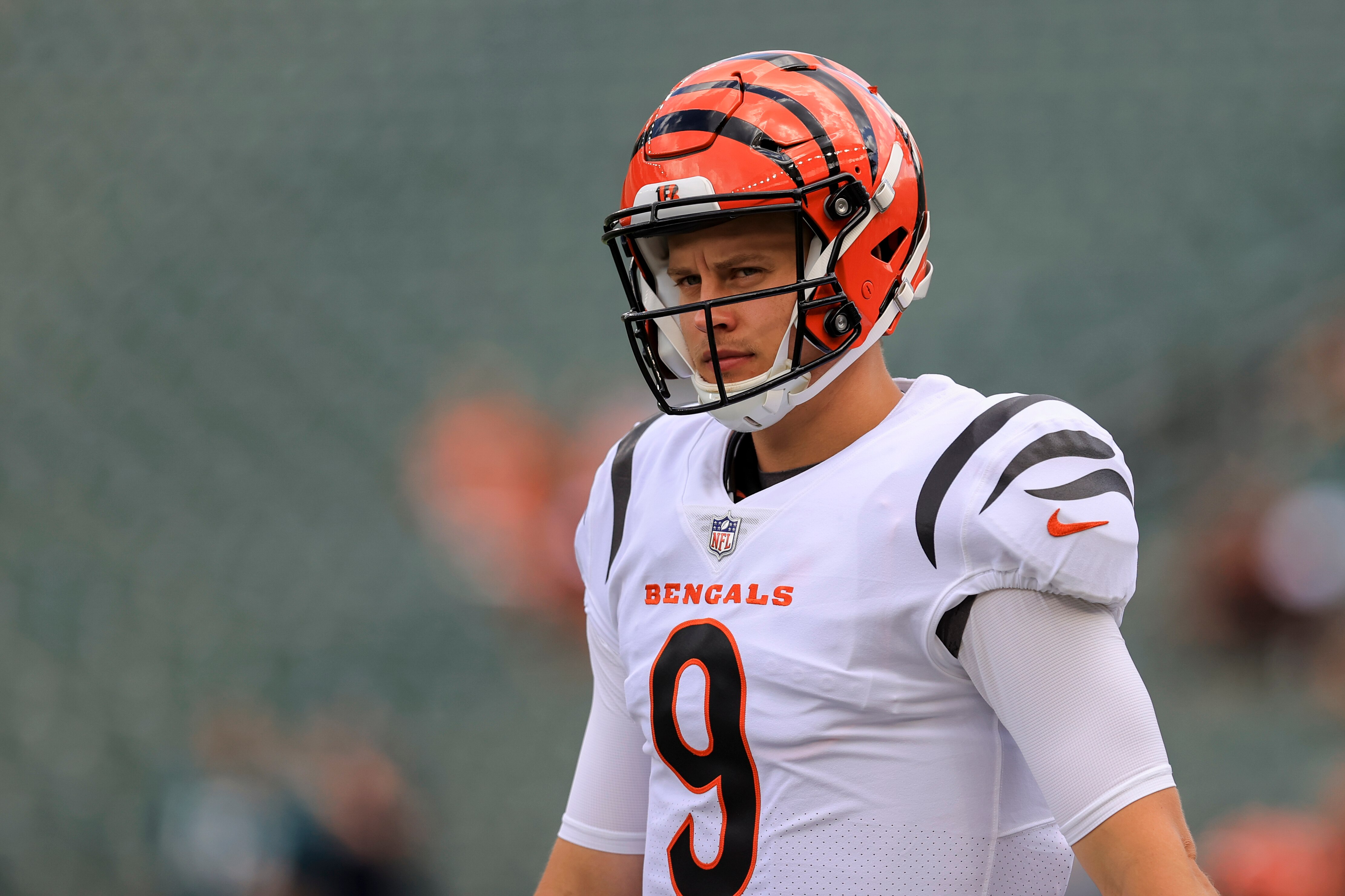 Cincinnati Bengals' quarterback Joe Burrow (9) stands on the field before an NFL preseason football game against the Miami Dolphins in Cincinnati, Sunday, Aug. 29, 2021. The Dolphins won 29-26. (AP Photo/Aaron Doster)