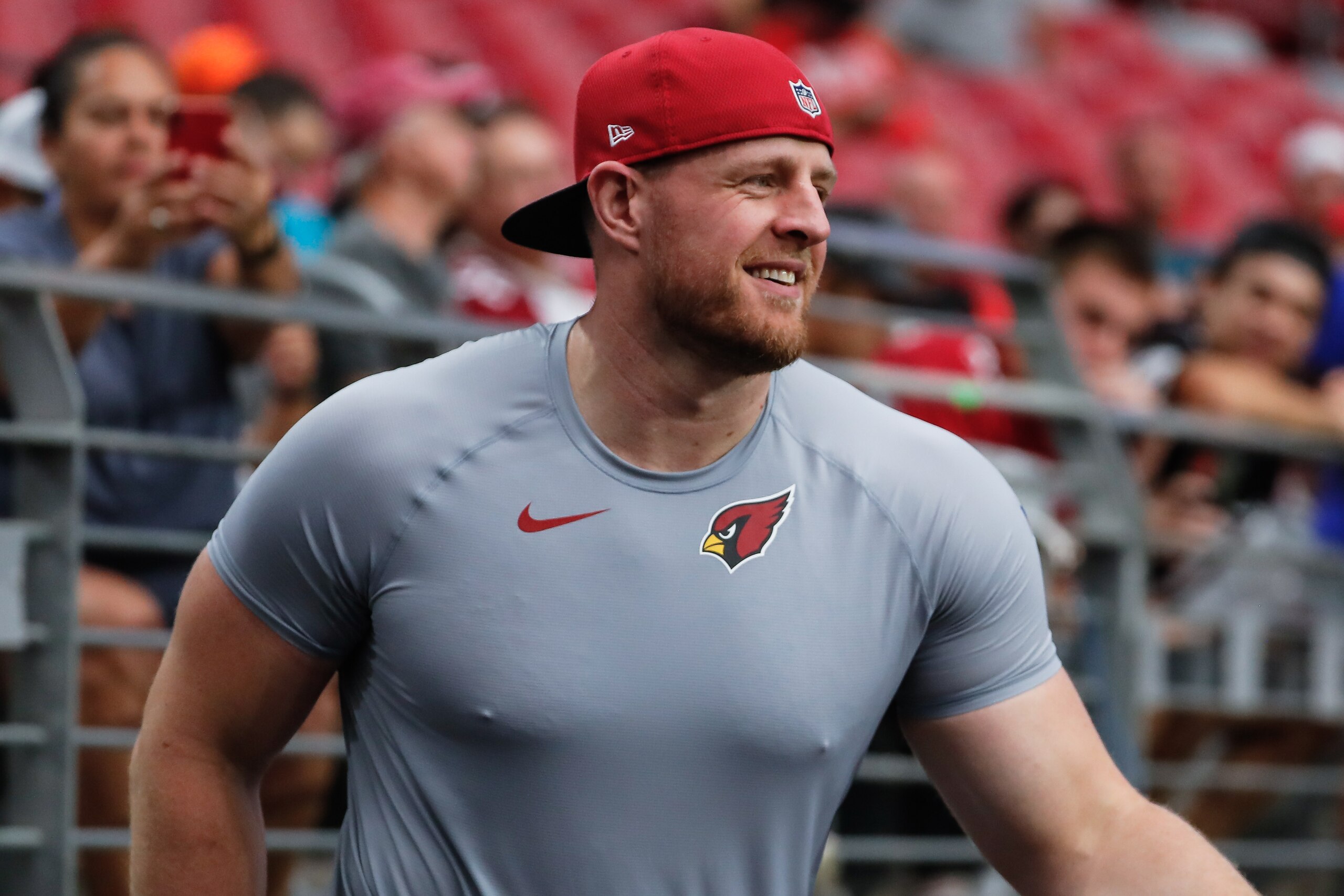 GLENDALE, AZ - AUGUST 04:  Arizona Cardinals defensive end J.J. Watt (99) smiles on the sideline during Arizona Cardinals training camp on August 4, 2021 at State Farm Stadium in Glendale, Arizona  (Photo by Kevin Abele/Icon Sportswire via Getty Images)
