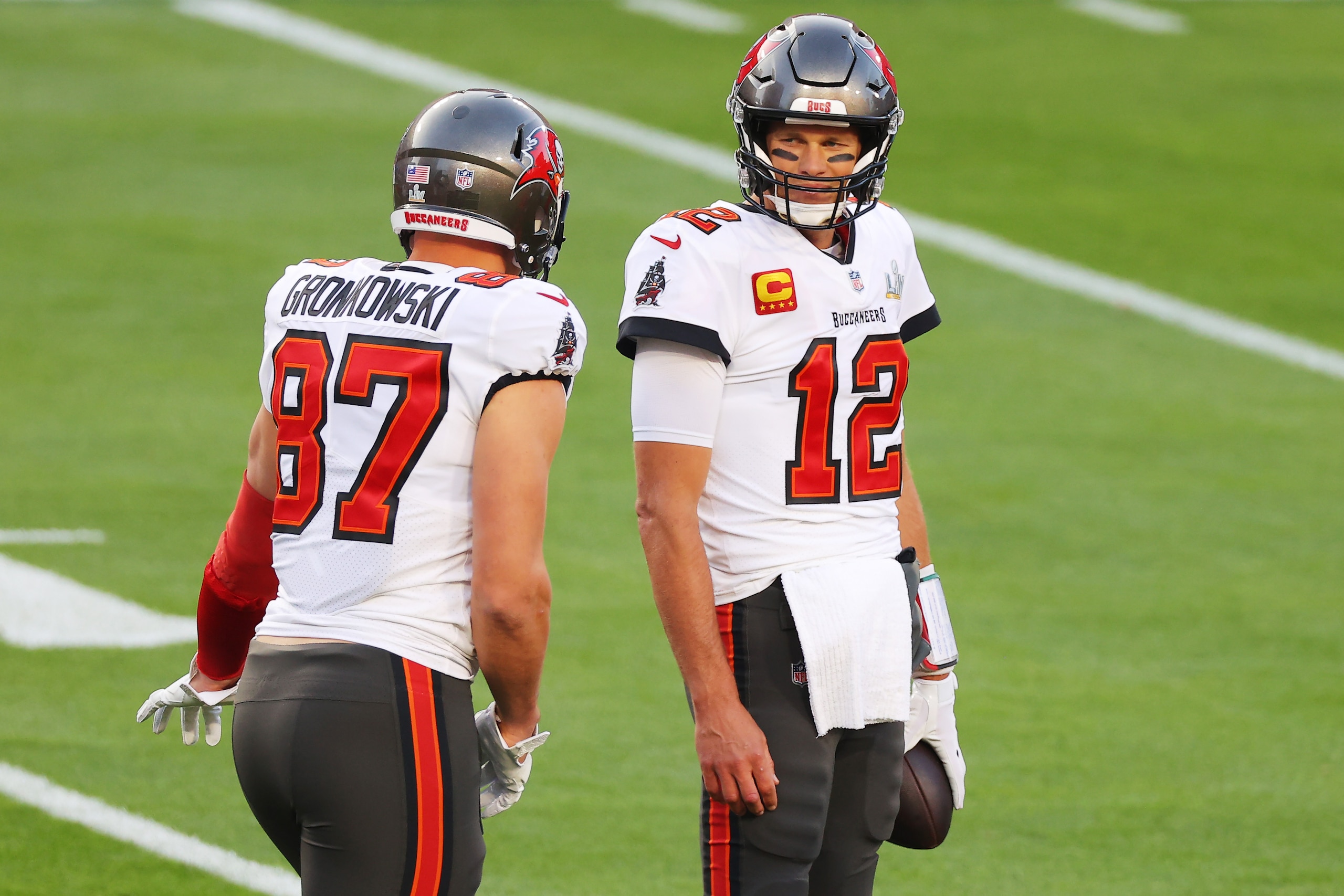 TAMPA, FLORIDA - FEBRUARY 07: Tom Brady #12 and Rob Gronkowski #87 of the Tampa Bay Buccaneers warm up before Super Bowl LV against the Kansas City Chiefs at Raymond James Stadium on February 07, 2021 in Tampa, Florida. (Photo by Kevin C. Cox/Getty Images) TAMPA, FLORIDA - FEBRUARY 07: Tom Brady #12 and Rob Gronkowski #87 of the Tampa Bay Buccaneers warm up before Super Bowl LV against the Kansas City Chiefs at Raymond James Stadium on February 07, 2021 in Tampa, Florida. (Photo by Kevin C. Cox/Getty Images)
