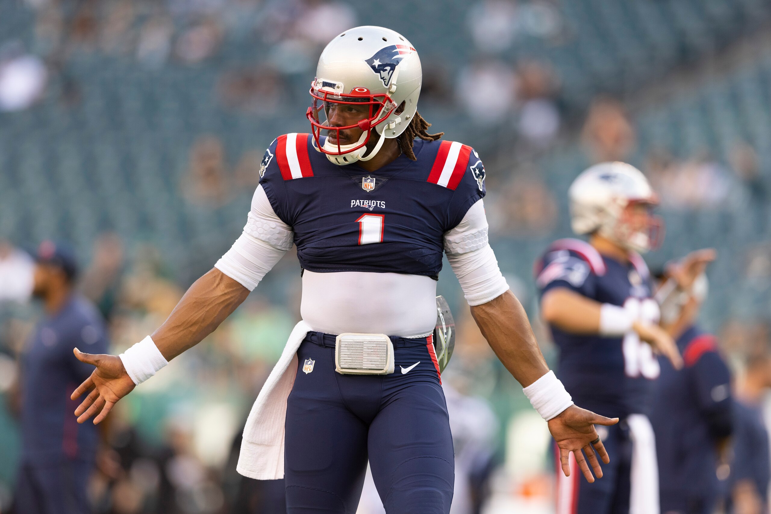 PHILADELPHIA, PA - AUGUST 19: Cam Newton #1 of the New England Patriots looks on against the Philadelphia Eagles in the preseason game at Lincoln Financial Field on August 19, 2021 in Philadelphia, Pennsylvania. The Patriots defeated the Eagles 35-0. (Photo by Mitchell Leff/Getty Images) PHILADELPHIA, PA - AUGUST 19: Cam Newton #1 of the New England Patriots looks on against the Philadelphia Eagles in the preseason game at Lincoln Financial Field on August 19, 2021 in Philadelphia, Pennsylvania. The Patriots defeated the Eagles 35-0. (Photo by Mitchell Leff/Getty Images)