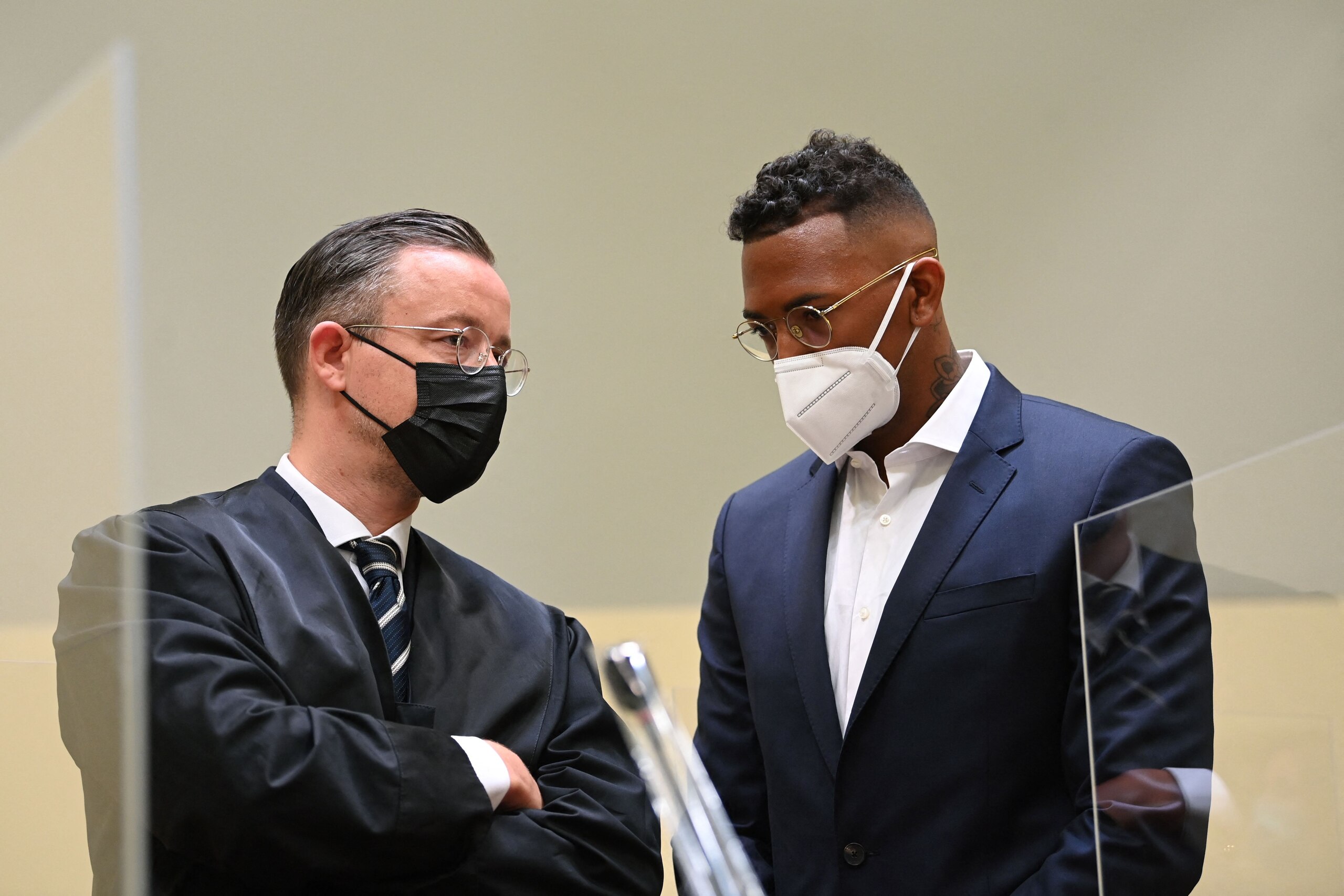 Former Bayern Munich's defender Jerome Boateng (R) and his lawyer Kai Walden are seen on the day of the footballer's trial in court in Munich, southern Germany, on September 9, 2021. - German 2014 World Cup winner Jerome Boateng appeared in court in Munich on September 9, 2021 to answer allegations he assaulted the mother of his twin daughters in 2018. (Photo by CHRISTOF STACHE / AFP) (Photo by CHRISTOF STACHE/AFP via Getty Images) Former Bayern Munich's defender Jerome Boateng (R) and his lawyer Kai Walden are seen on the day of the footballer's trial in court in Munich, southern Germany, on September 9, 2021. - German 2014 World Cup winner Jerome Boateng appeared in court in Munich on September 9, 2021 to answer allegations he assaulted the mother of his twin daughters in 2018. (Photo by CHRISTOF STACHE / AFP) (Photo by CHRISTOF STACHE/AFP via Getty Images)