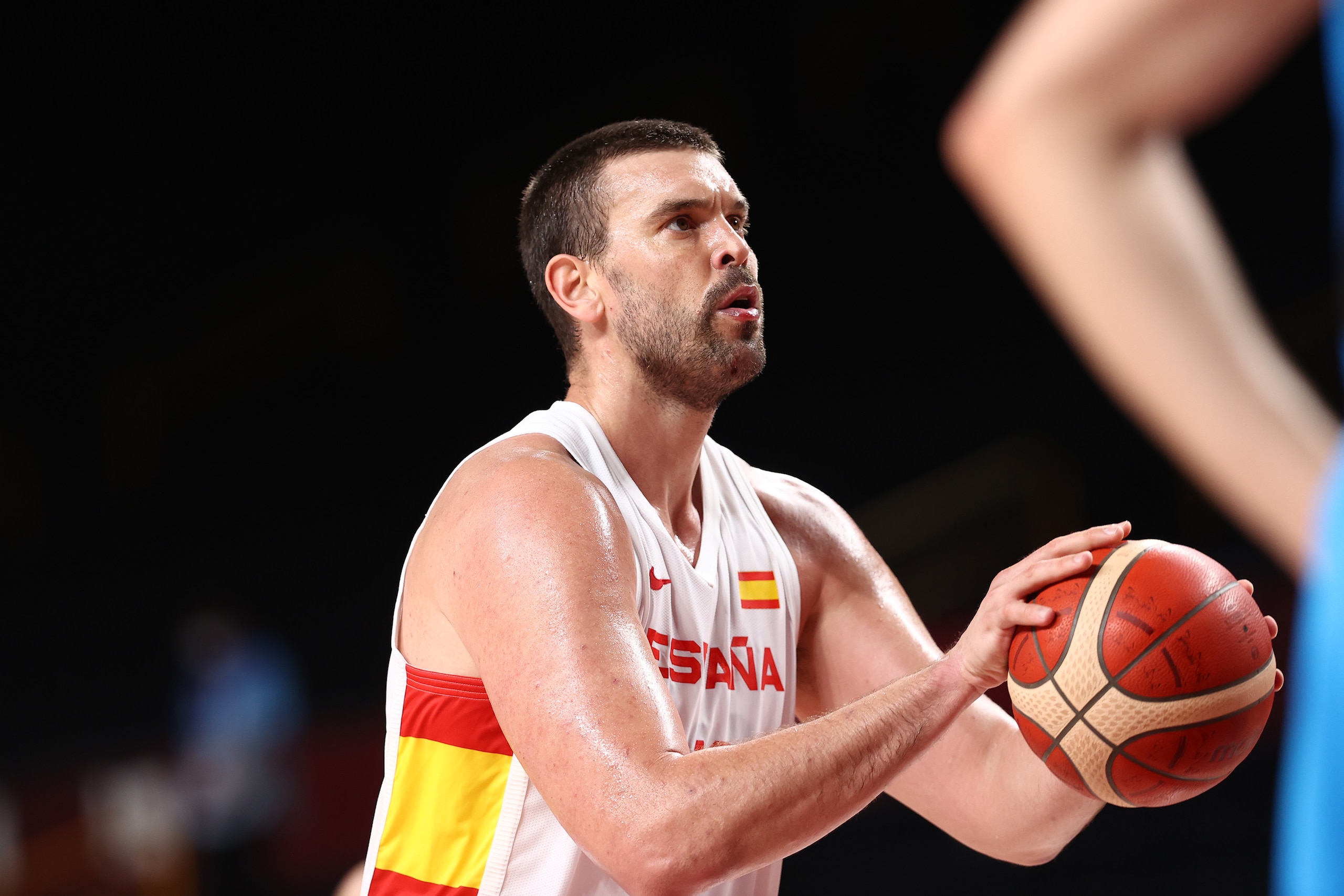 TOKYO, JAPAN - AUGUST 1: Marc Gasol #13 of the Spain Men's National Team shoots a free throw against the Slovenia Men's National Team during the 2020 Tokyo Olympics at the Saitama Super Arena on August 1, 2021 in Tokyo, Japan. NOTE TO USER: User expressly acknowledges and agrees that, by downloading and/or using this Photograph, user is consenting to the terms and conditions of the Getty Images License Agreement. Mandatory Copyright Notice: Copyright 2021 NBAE (Photo by Stephen Gosling/NBAE via Getty Images)