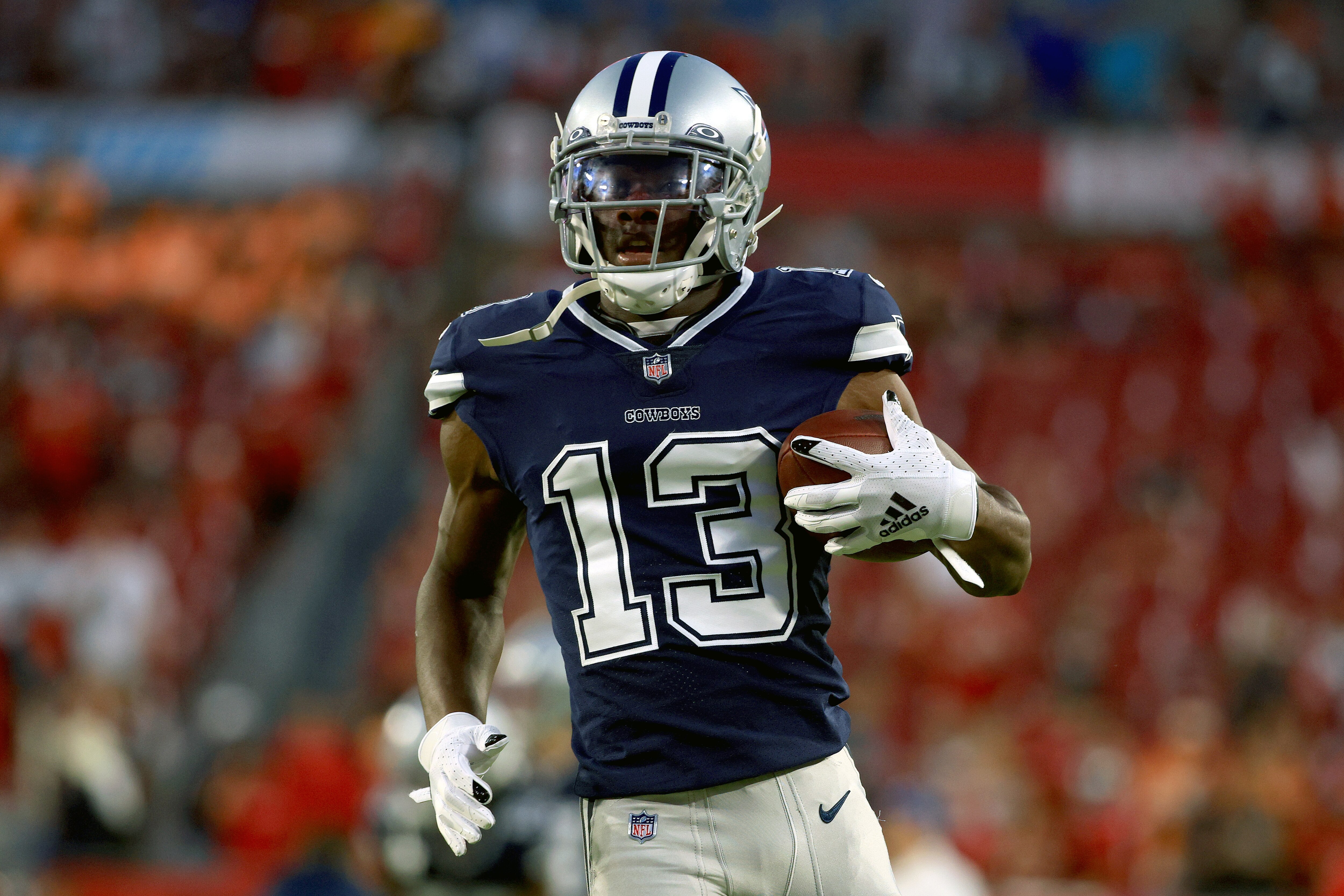 TAMPA, FLORIDA - SEPTEMBER 09: Michael Gallup #13 of the Dallas Cowboys warms up before the game against the Tampa Bay Buccaneers at Raymond James Stadium on September 09, 2021 in Tampa, Florida. (Photo by Mike Ehrmann/Getty Images)