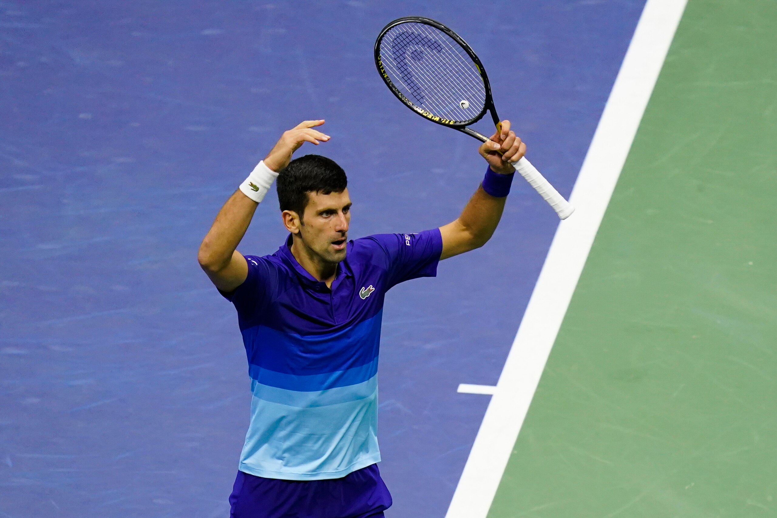 Novak Djokovic, of Serbia, reacts after scoring a point against Alexander Zverev, of Germany, during the semifinals of the US Open tennis championships, Friday, Sept. 10, 2021, in New York. (AP Photo/Seth Wenig) Novak Djokovic, of Serbia, reacts after scoring a point against Alexander Zverev, of Germany, during the semifinals of the US Open tennis championships, Friday, Sept. 10, 2021, in New York. (AP Photo/Seth Wenig)