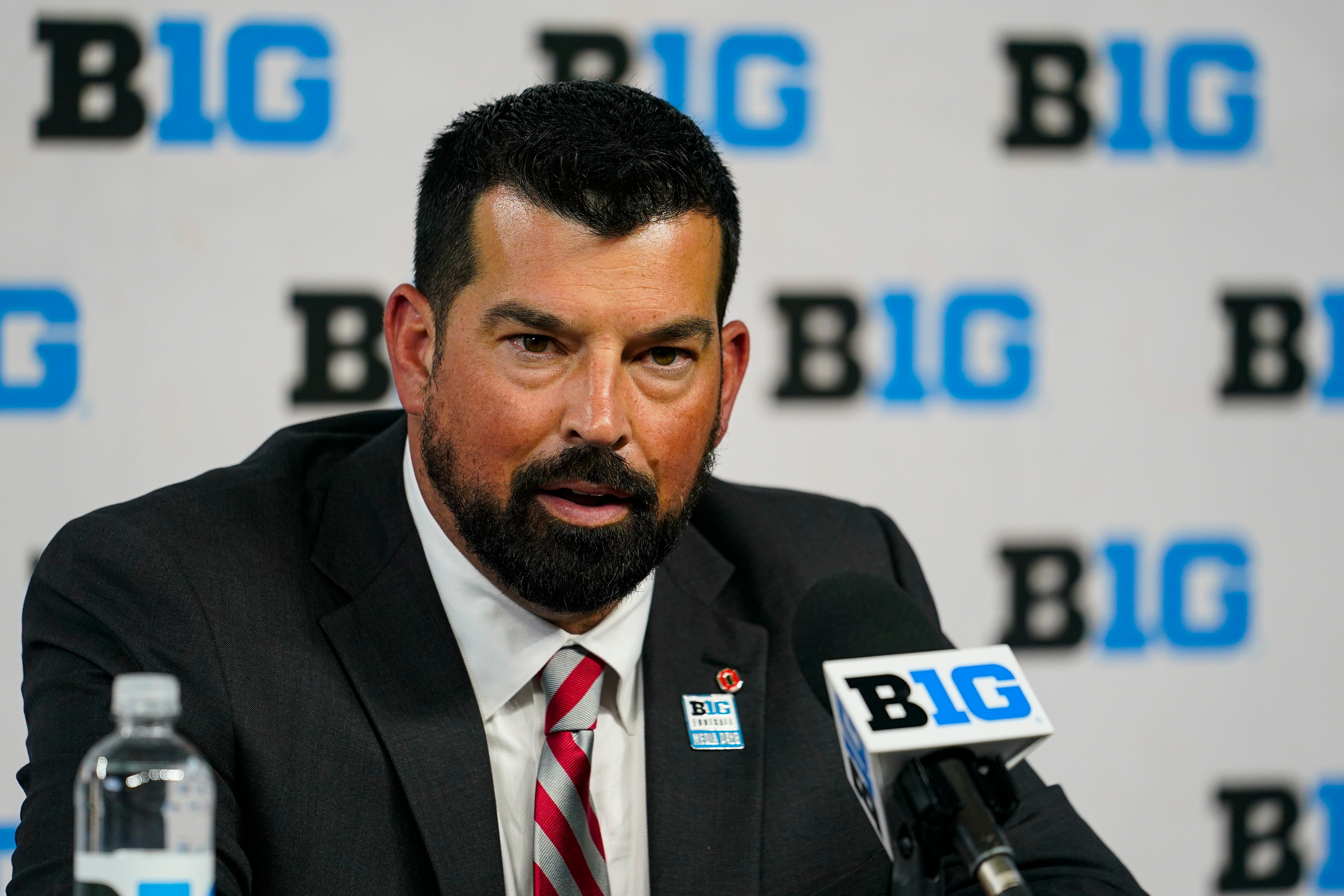 Ohio State head coach Ryan Day talks to reporters during an NCAA college football news conference at the Big Ten Conference media days, at Lucas Oil Stadium in Indianapolis, Friday, July 23, 2021. (AP Photo/Michael Conroy)