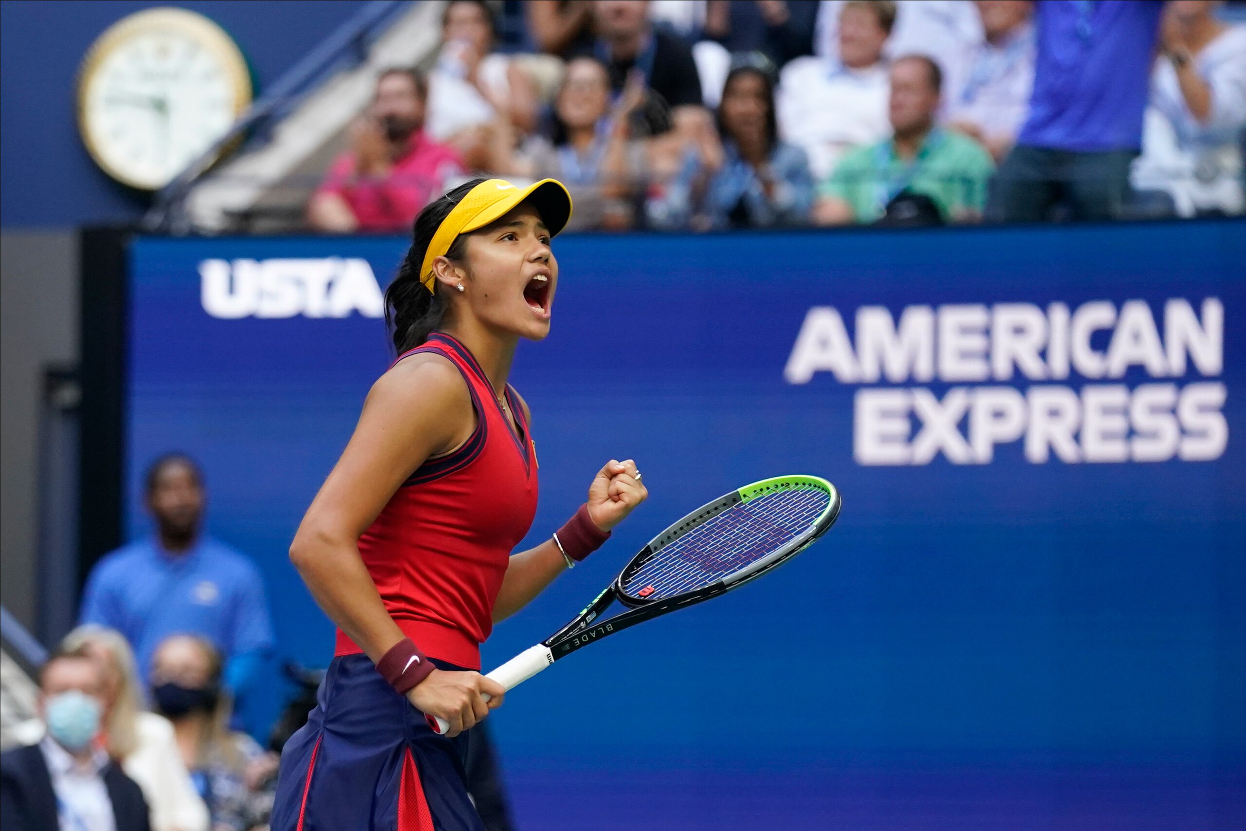 Emma Raducanu, of Britain, reacts after scoring a point against Leylah Fernandez, of Canada, during the women's singles final of the US Open tennis championships, Saturday, Sept. 11, 2021, in New York. (AP Photo/Seth Wenig)