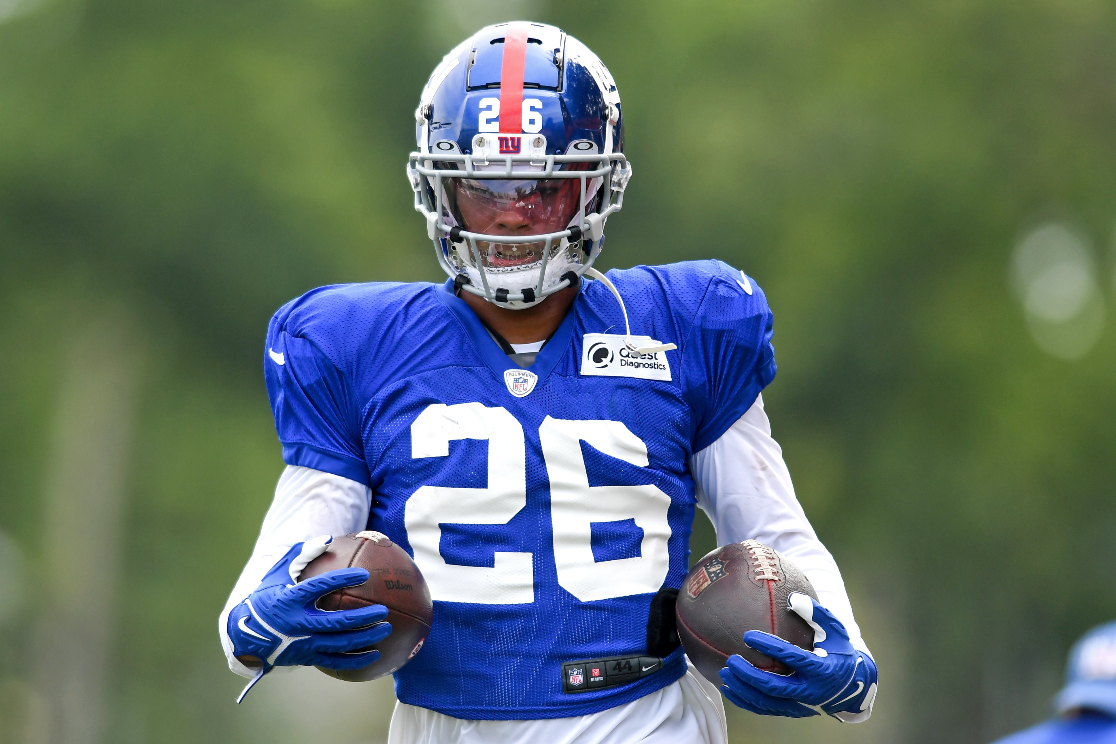 BEREA, OH - AUGUST 19: Running back Saquon Barkley #26 of the New York Giants runs a drill during a joint practice with the Cleveland Browns on August 19, 2021 in Berea, Ohio. (Photo by Nick Cammett/Diamond Images via Getty Images)