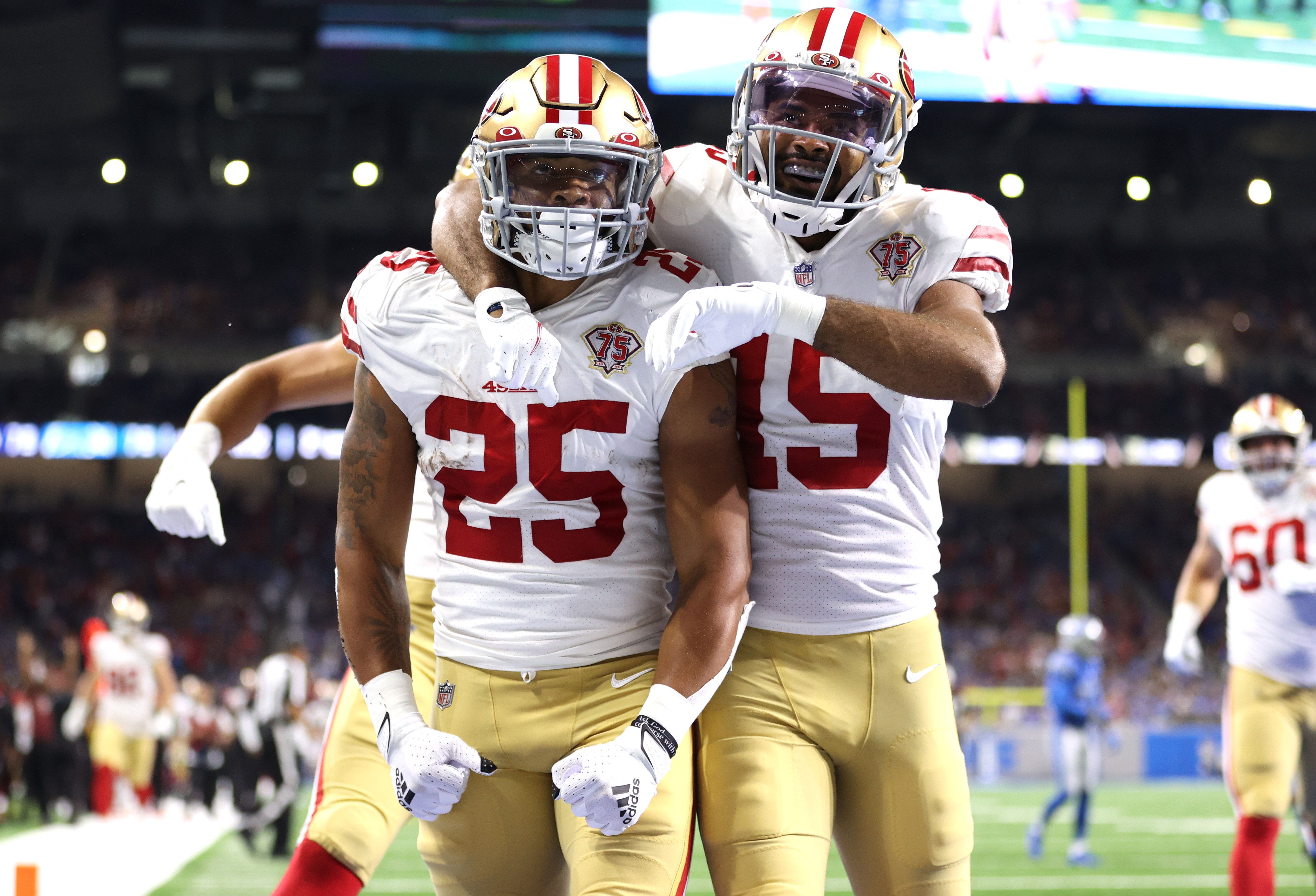 DETROIT, MICHIGAN - SEPTEMBER 12: Elijah Mitchell #25 of the San Francisco 49ers celebrates his 38-yard rushing touchdown against the Detroit Lions during the second quarter  at Ford Field on September 12, 2021 in Detroit, Michigan. (Photo by Gregory Shamus/Getty Images)