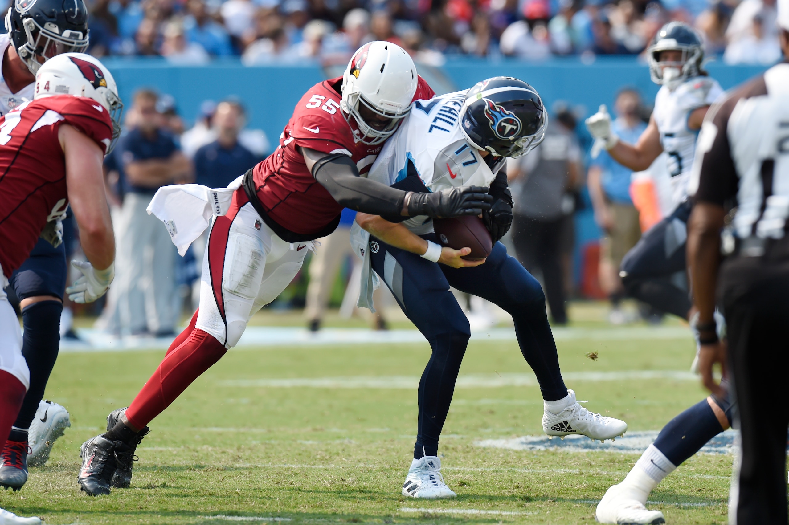 Arizona Cardinals linebacker Chandler Jones (55) sacks Tennessee Titans quarterback Ryan Tannehill (17) in the second half of an NFL football game Sunday, Sept. 12, 2021, in Nashville, Tenn. (AP Photo/Mark Zaleski)