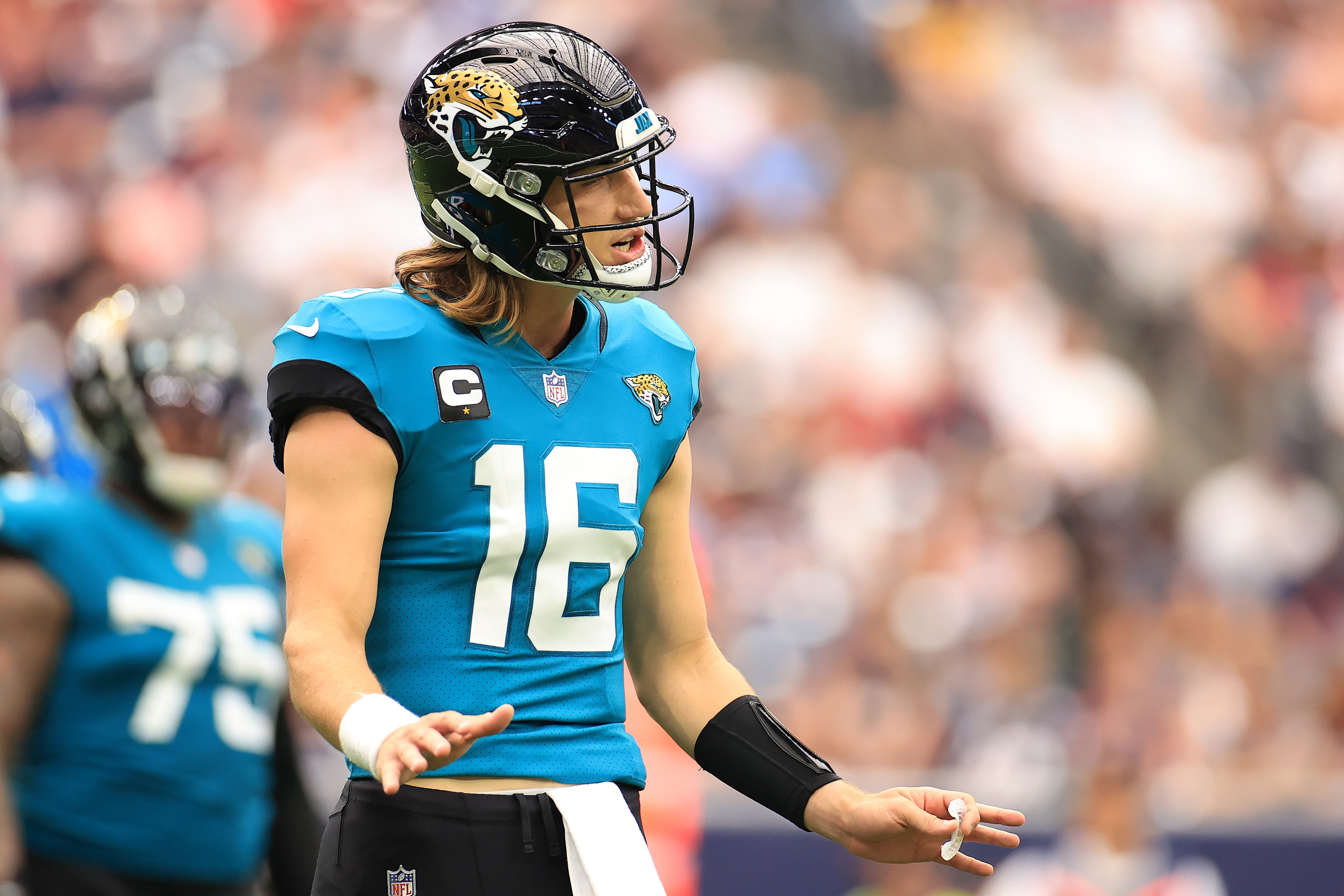 HOUSTON, TEXAS - SEPTEMBER 12: Trevor Lawrence #16 of the Jacksonville Jaguars reacts against the Houston Texans during the first half at NRG Stadium on September 12, 2021 in Houston, Texas. (Photo by Carmen Mandato/Getty Images)