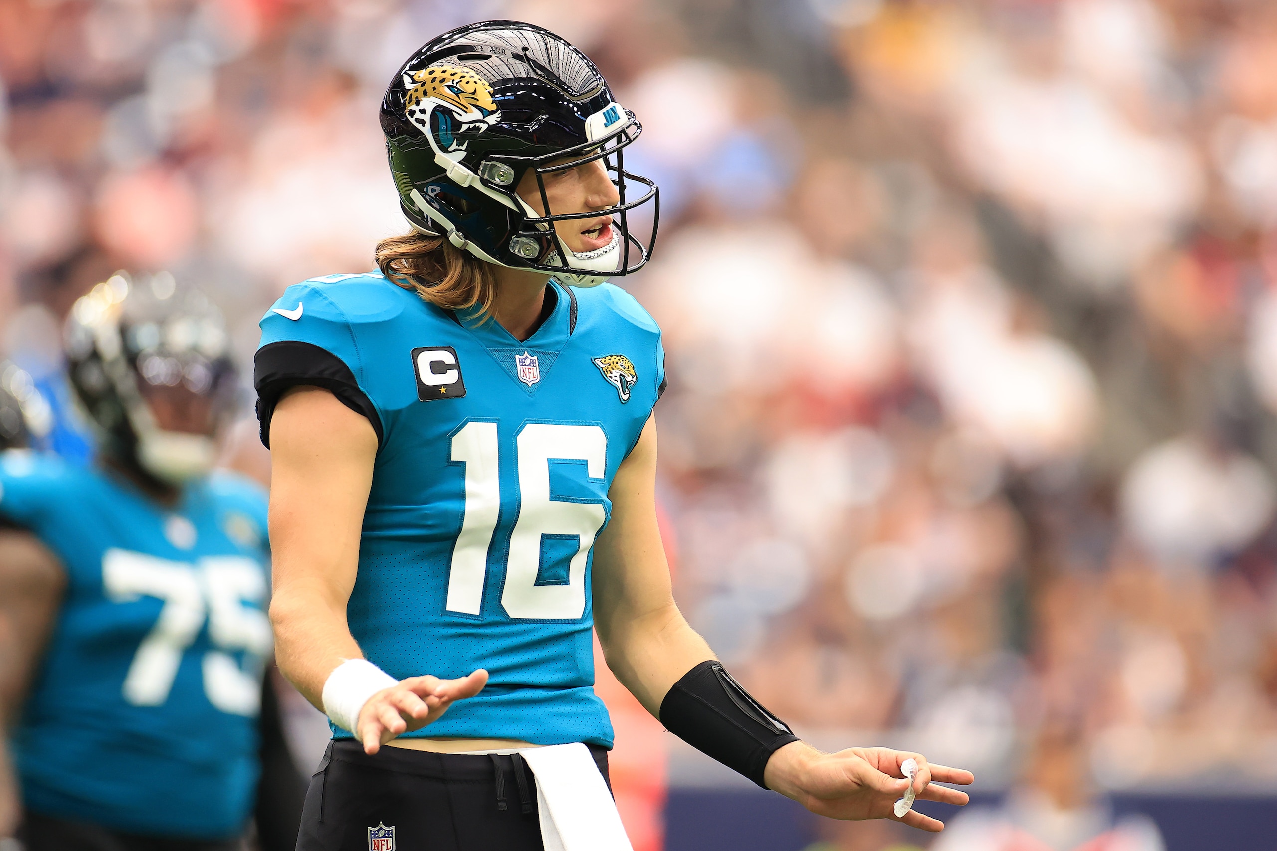 HOUSTON, TEXAS - SEPTEMBER 12: Trevor Lawrence #16 of the Jacksonville Jaguars reacts against the Houston Texans during the first half at NRG Stadium on September 12, 2021 in Houston, Texas. (Photo by Carmen Mandato/Getty Images)