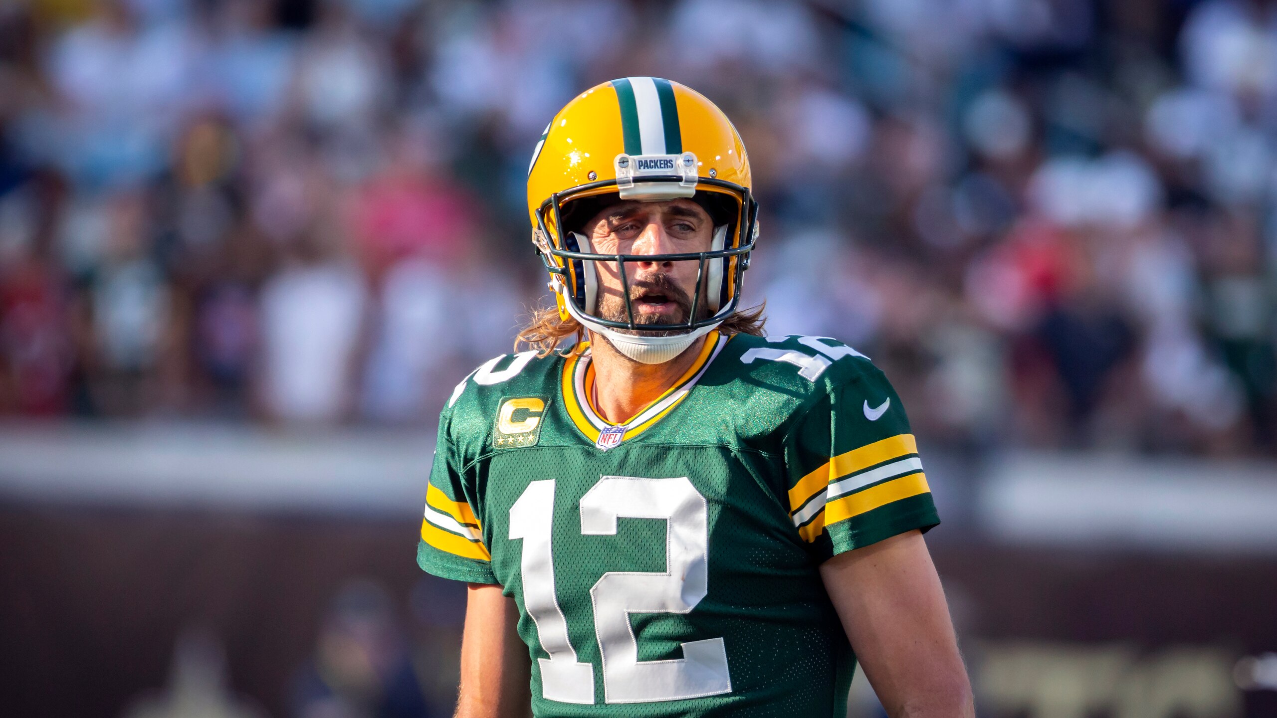 Green Bay Packers quarterback Aaron Rodgers (12) calls a play at the line of scrimmage during the second half of an NFL football game against the New Orleans Saints, Sunday, Sept. 12, 2021, in Jacksonville, Fla. (AP Photo/Stephen B. Morton)