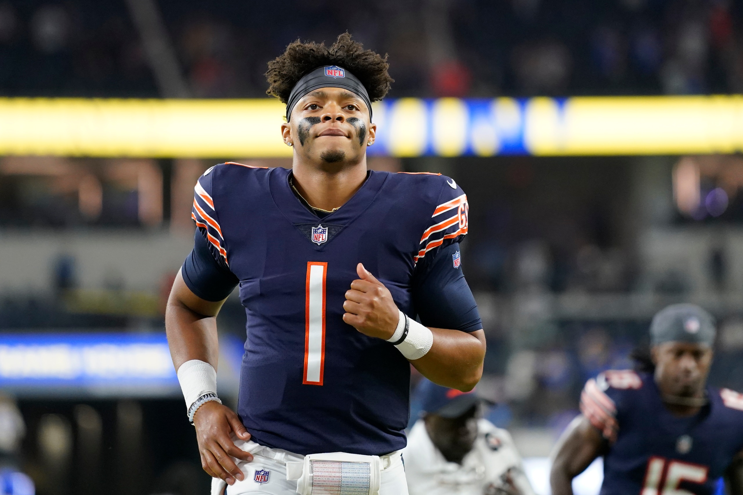Chicago Bears quarterback Justin Fields leaves the field after an NFL football game against the Los Angeles Rams, Sunday, Sept. 12, 2021, in Inglewood, Calif. (AP Photo/Jae C. Hong)