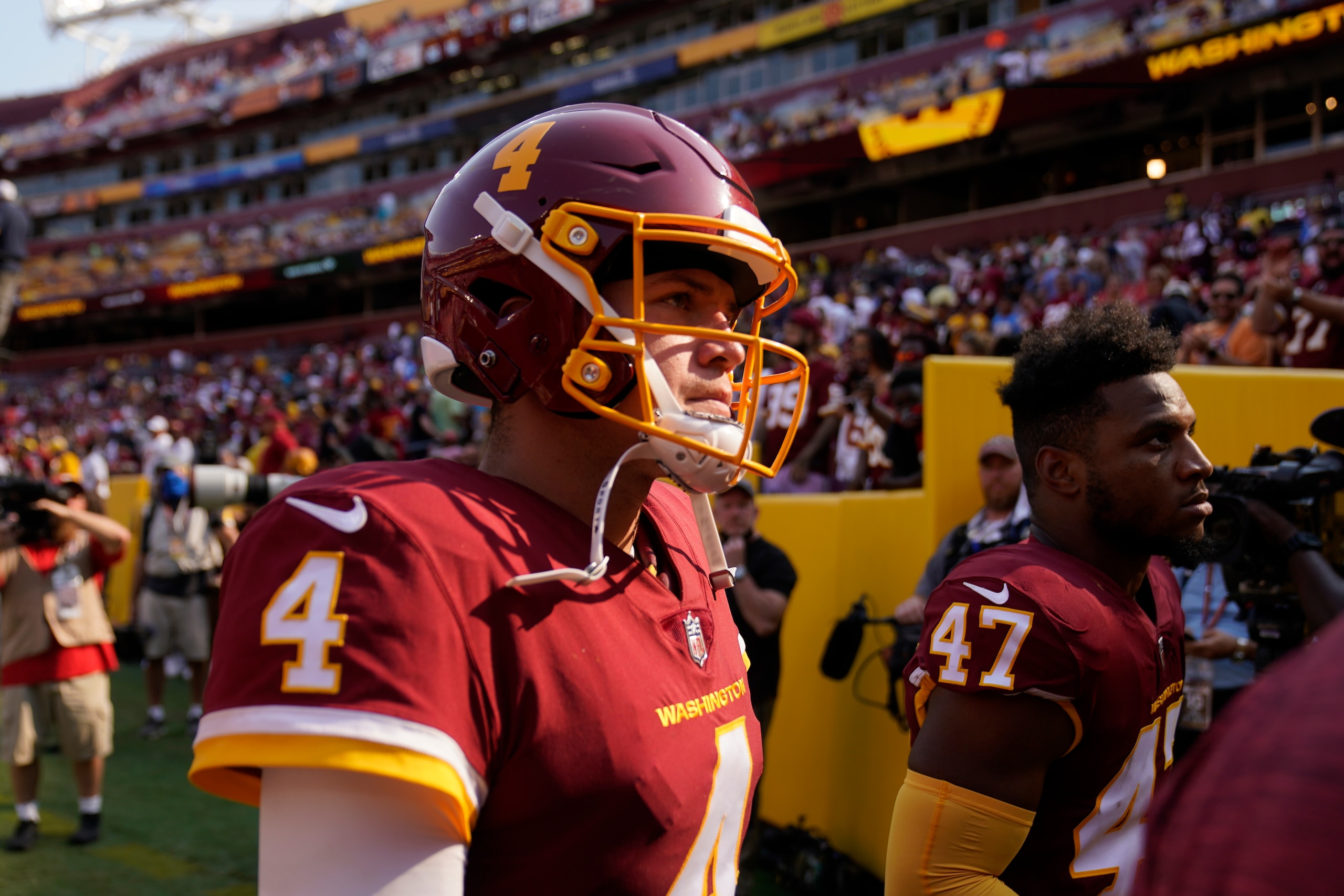 Washington Football Team quarterback Taylor Heinicke (4) walks off the field at the end of an NFL football game against the Los Angeles Chargers, Sunday, Sept. 12, 2021, in Landover, Md. Chargers won 20-16. (AP Photo/Andrew Harnik) Washington Football Team quarterback Taylor Heinicke (4) walks off the field at the end of an NFL football game against the Los Angeles Chargers, Sunday, Sept. 12, 2021, in Landover, Md. Chargers won 20-16. (AP Photo/Andrew Harnik)