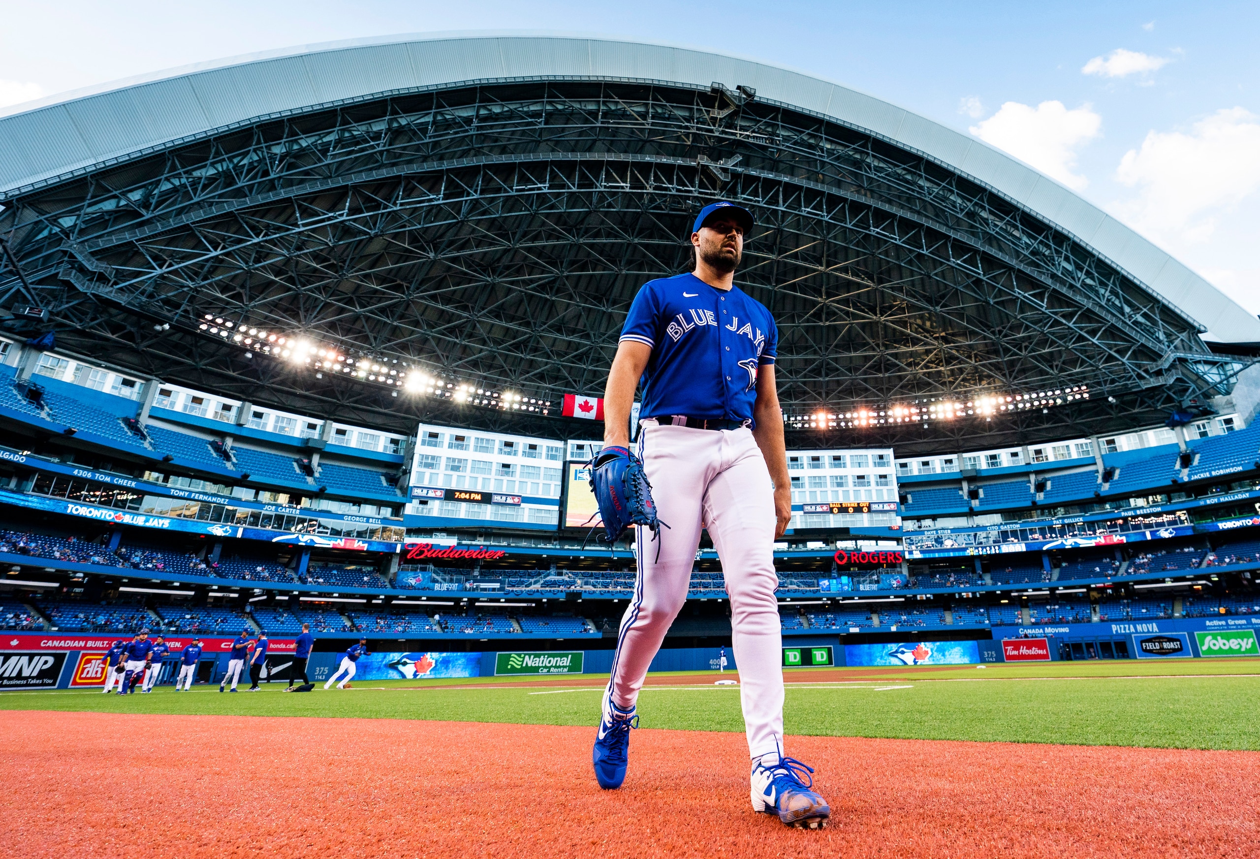 TORONTO, ONTARIO - AUGUST 30: Robbie Ray #38 of the Toronto Blue Jays walks to the dugout before playing the Baltimore Orioles before their MLB game at the Rogers Centre on August 30, 2021 in Toronto, Ontario, Canada. (Photo by Mark Blinch/Getty Images) TORONTO, ONTARIO - AUGUST 30: Robbie Ray #38 of the Toronto Blue Jays walks to the dugout before playing the Baltimore Orioles before their MLB game at the Rogers Centre on August 30, 2021 in Toronto, Ontario, Canada. (Photo by Mark Blinch/Getty Images)