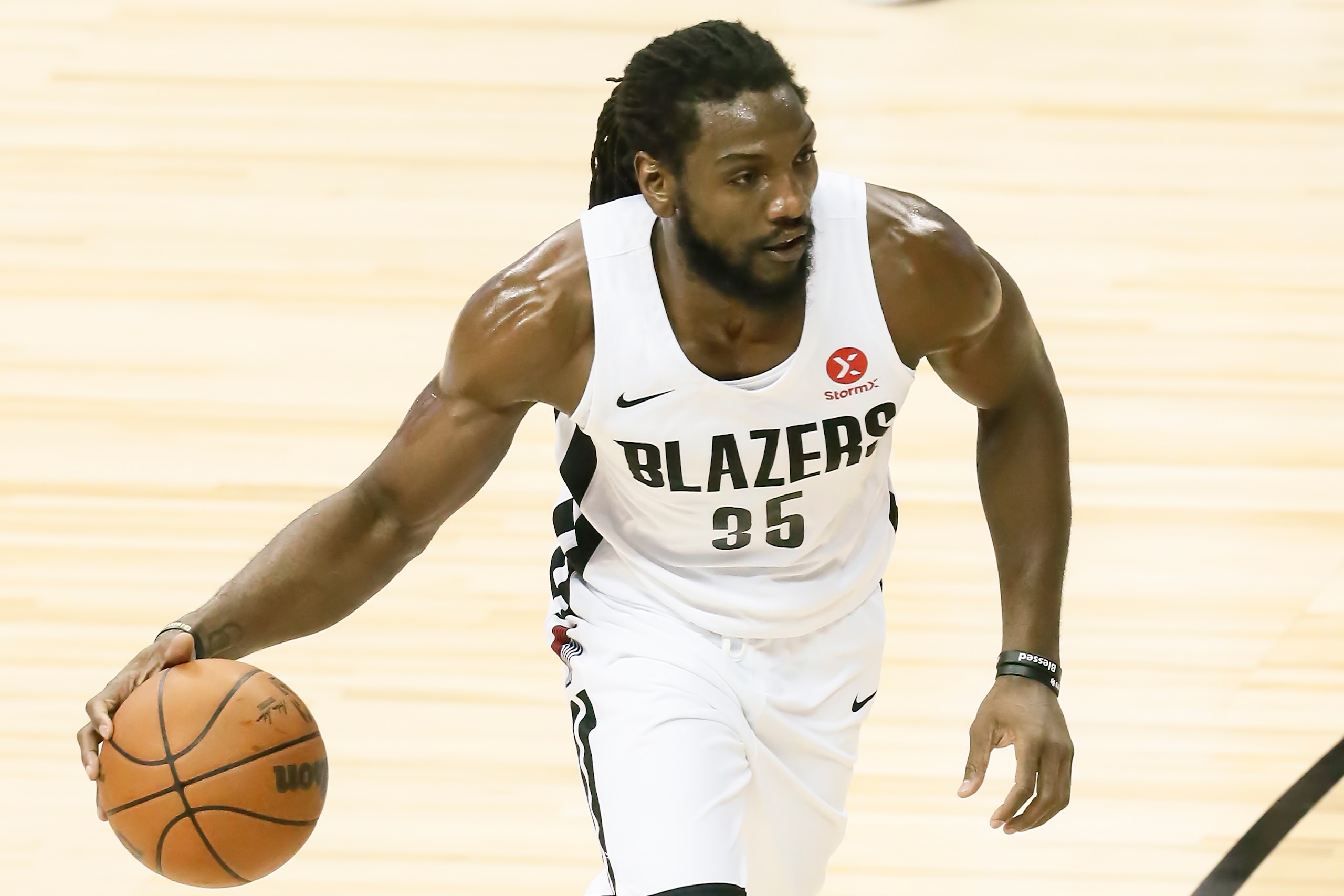 LAS VEGAS, NV - AUGUST 10: Kenneth Faried #35 of the Portland Trail Blazers handles the ball during the 2021 Las Vegas Summer League on August 10, 2021 at the Thomas & Mack Center in Las Vegas, Nevada. NOTE TO USER: User expressly acknowledges and agrees that, by downloading and/or using this Photograph, user is consenting to the terms and conditions of the Getty Images License Agreement. Mandatory Copyright Notice: Copyright 2021 NBAE (Photo by Chris Elise/NBAE via Getty Images)