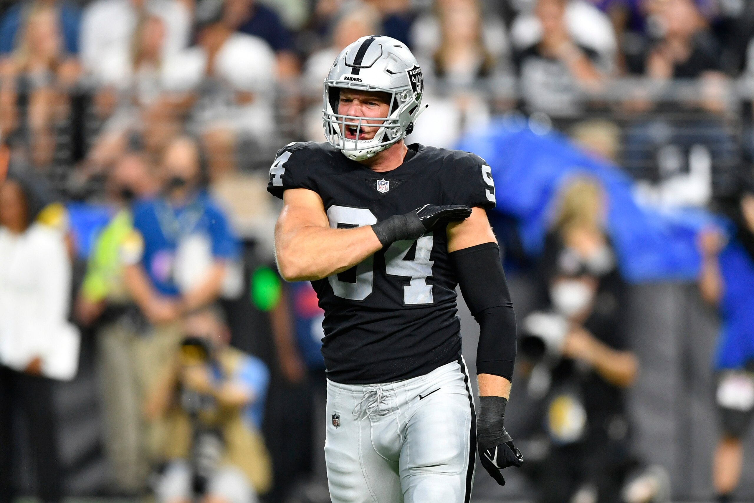 LAS VEGAS, NEVADA - SEPTEMBER 13:  Defensive end Carl Nassib #94 of the Las Vegas Raiders reacts after making a tackle for a loss of yardage during the second quarter against the Baltimore Ravens at Allegiant Stadium on September 13, 2021 in Las Vegas, Nevada. The Raiders defeated the Ravens 33-27 in overtime. (Photo by Chris Unger/Getty Images)