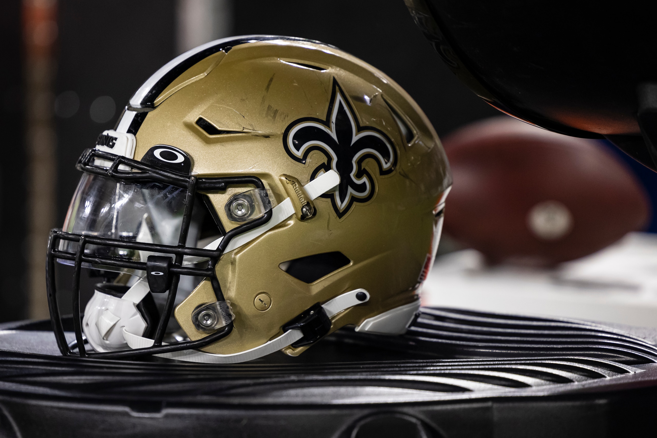 BALTIMORE, MD - AUGUST 14: A New Orleans Saints helmet is seen on the sidelines during the second half of a preseason game against the Baltimore Ravens at M&T Bank Stadium on August 14, 2021 in Baltimore, Maryland. (Photo by Scott Taetsch/Getty Images)