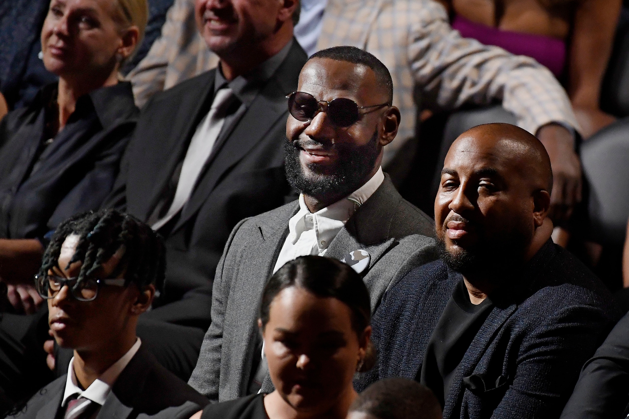 Lebron James sits in the audience at the 2021 Basketball Hall of Fame Enshrinement ceremony, Saturday, Sept. 11, 2021, in Springfield, Mass. (AP Photo/Jessica Hill)