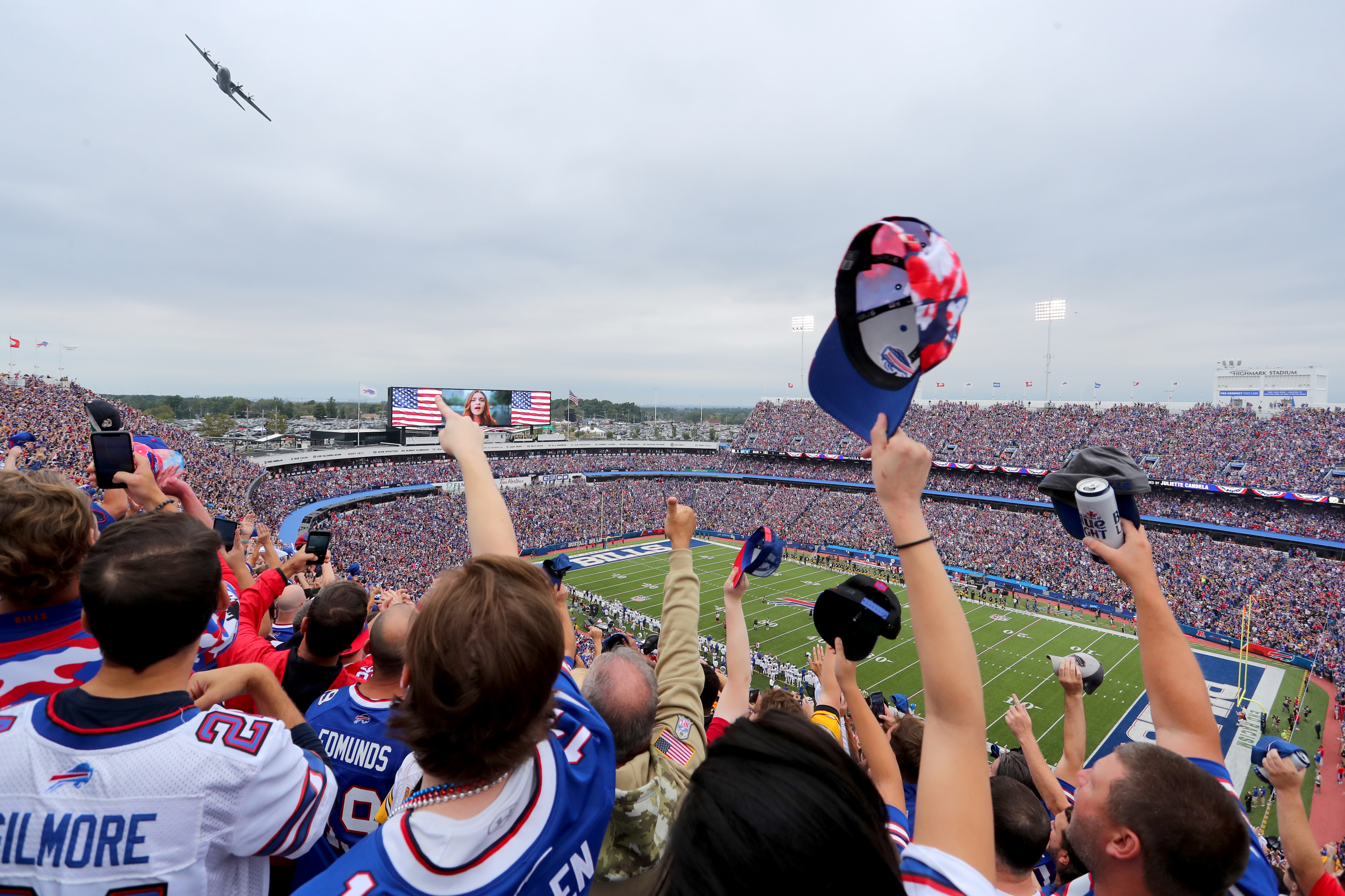 ORCHARD PARK, NEW YORK - SEPTEMBER 12: Fans of the Buffalo Bills gesture during a flyover prior to the game against the Pittsburgh Steelers at Highmark Stadium on September 12, 2021 in Orchard Park, New York. (Photo by Timothy T Ludwig/Getty Images)