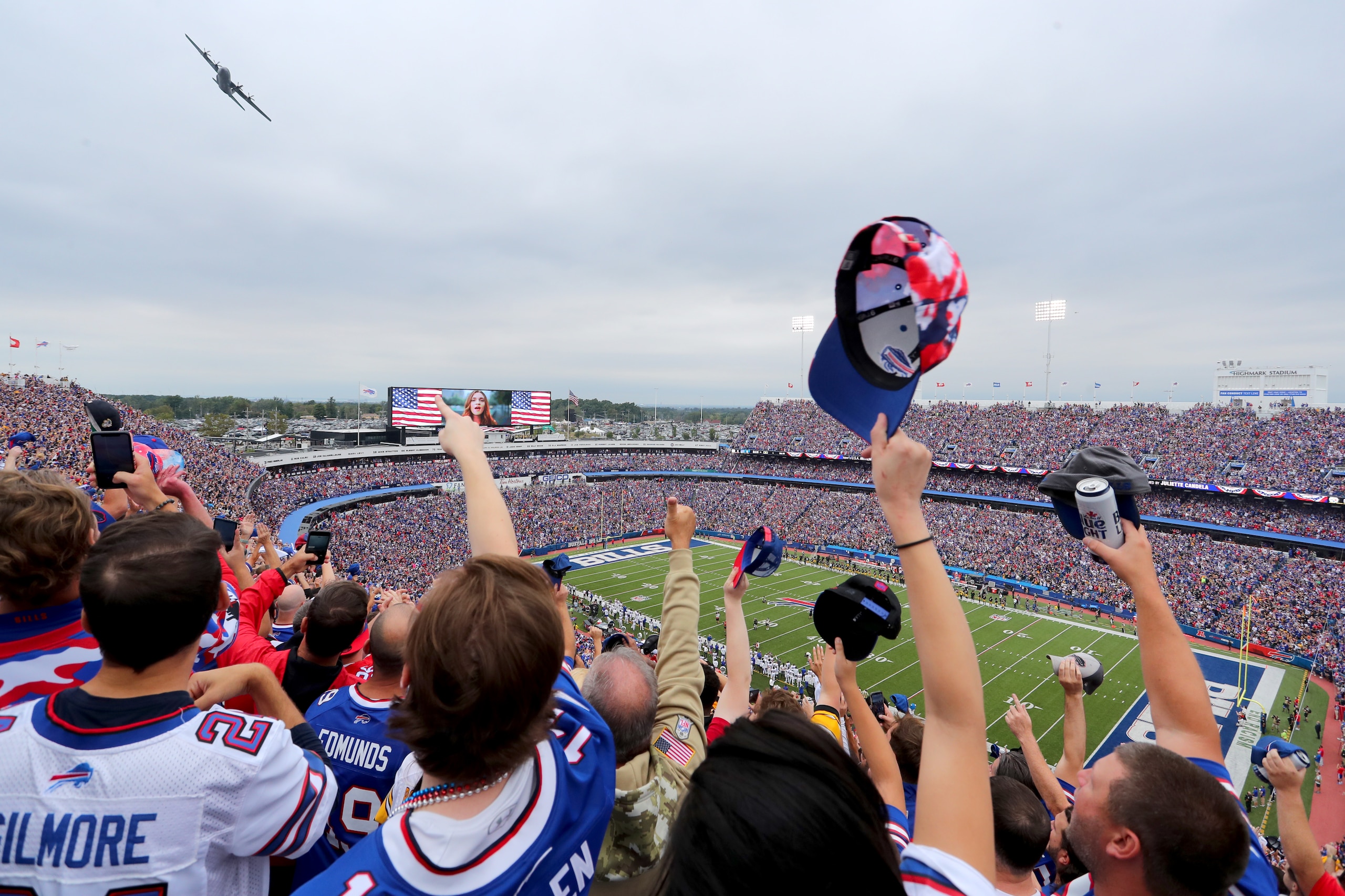 ORCHARD PARK, NEW YORK - SEPTEMBER 12: Fans of the Buffalo Bills gesture during a flyover prior to the game against the Pittsburgh Steelers at Highmark Stadium on September 12, 2021 in Orchard Park, New York. (Photo by Timothy T Ludwig/Getty Images)