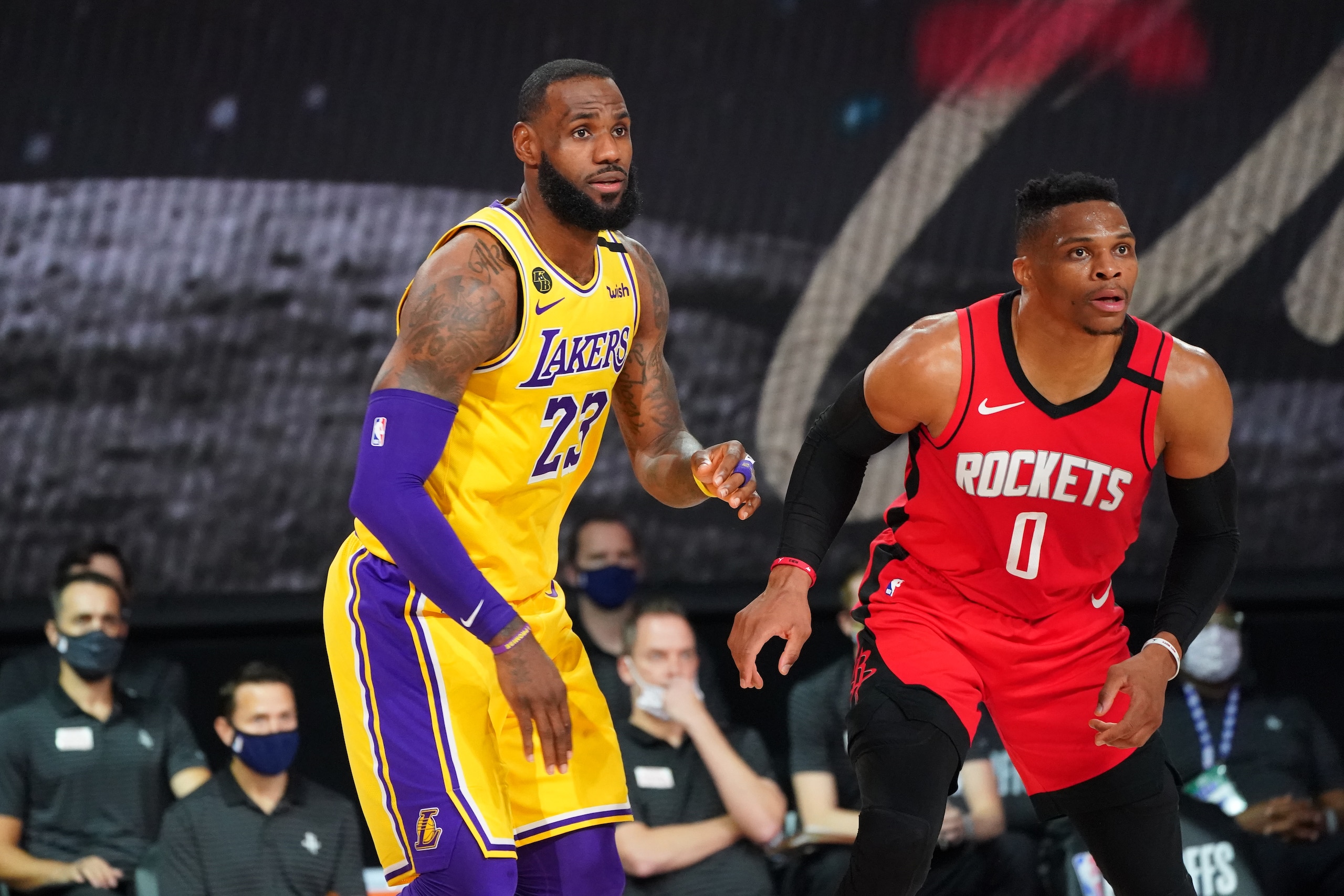 ORLANDO, FL - SEPTEMBER 10: LeBron James #23 of the Los Angeles Lakers plays defense against Russell Westbrook #0 of the Houston Rockets during Game Four of the Western Conference Semifinals on September 10, 2020 at the AdventHealth Arena at ESPN Wide World Of Sports Complex in Orlando, Florida. NOTE TO USER: User expressly acknowledges and agrees that, by downloading and/or using this Photograph, user is consenting to the terms and conditions of the Getty Images License Agreement. Mandatory Copyright Notice: Copyright 2020 NBAE (Photo by Jesse D. Garrabrant/NBAE via Getty Images)