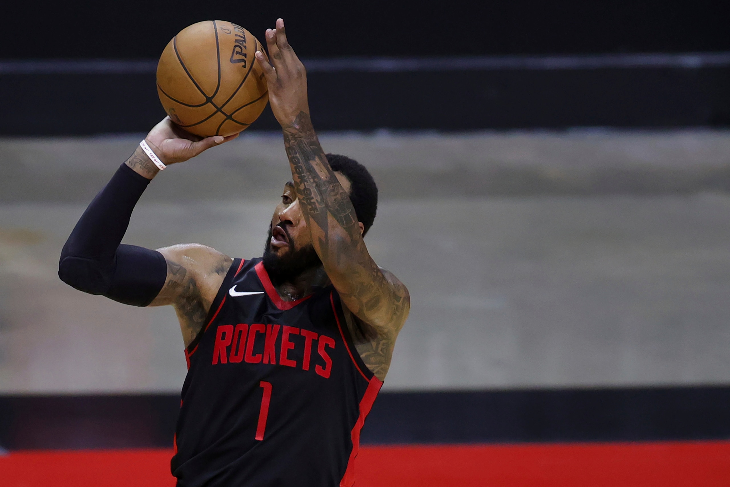 Houston Rockets' John Wall shoots a 3-point basket during the third quarter against the Los Angeles Clippers in an NBA basketball game Friday, April 23, 2021, in Houston. (Carmen Mandato/Pool Photo via AP)