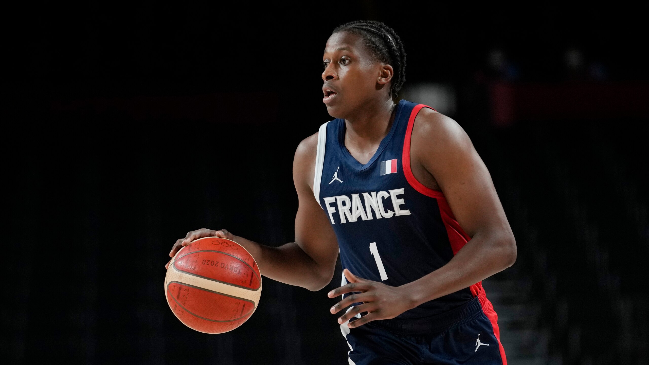 France's Frank Ntilikina (1) during a men's basketball quarterfinal round game against Italy at the 2020 Summer Olympics, Tuesday, Aug. 3, 2021, in Saitama, Japan. (AP Photo/Eric Gay) France's Frank Ntilikina (1) during a men's basketball quarterfinal round game against Italy at the 2020 Summer Olympics, Tuesday, Aug. 3, 2021, in Saitama, Japan. (AP Photo/Eric Gay)