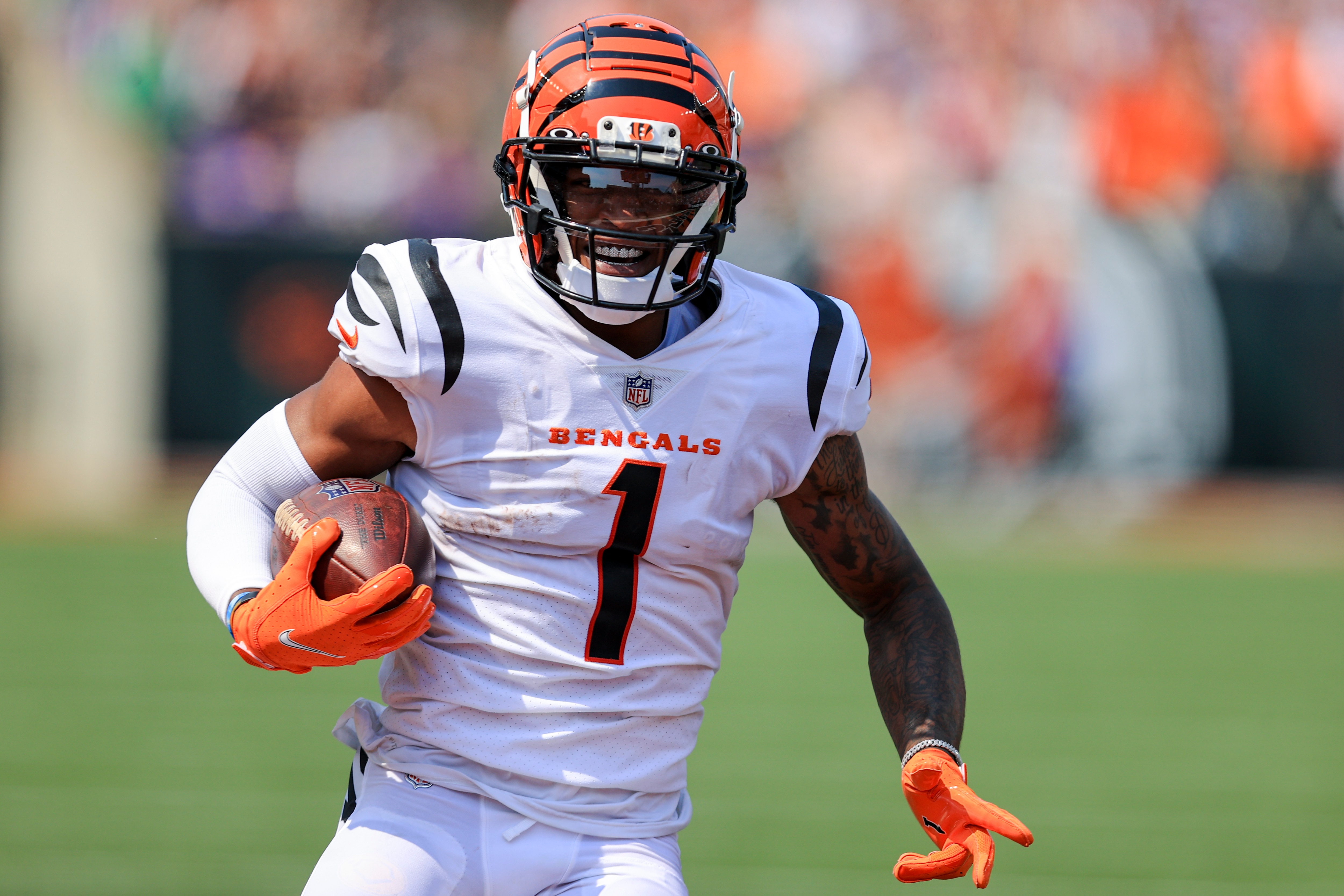 Cincinnati Bengals wide receiver Ja'Marr Chase makes a catch for a touchdown against the Minnesota Vikings during an NFL football game, Sunday, Sept. 12, 2021, in Cincinnati. The Bengals won 27-24. (AP Photo/Aaron Doster)