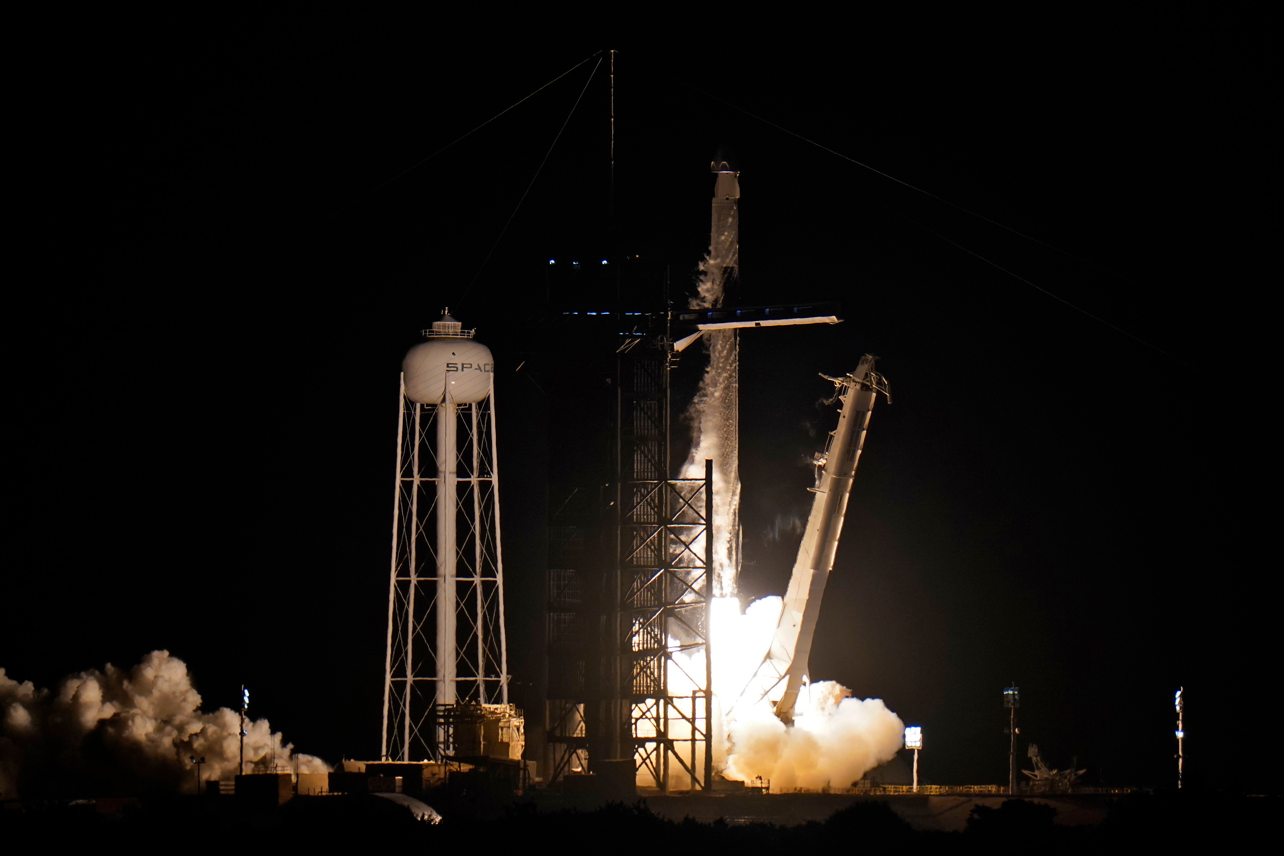 A SpaceX Falcon 9, with four private citizens onboard, lifts off from Kennedy Space Center's Launch Pad 39-A Wednesday, Sept. 15, 2021, in Cape Canaveral , Fla. (AP Photo/Chris O'Meara)