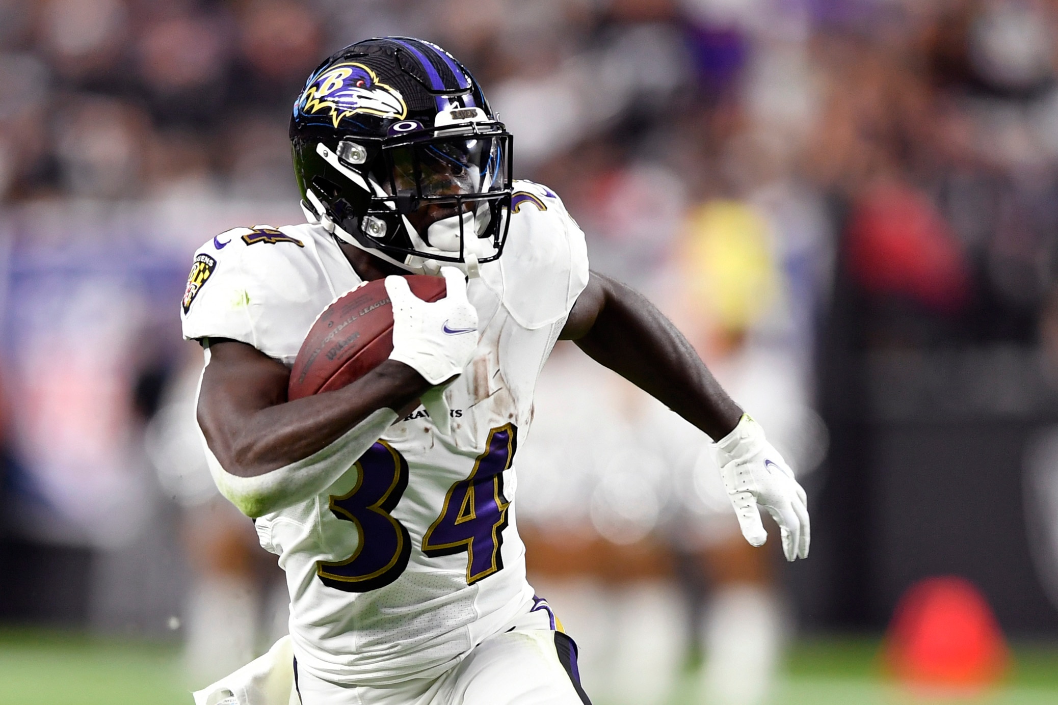 LAS VEGAS, NEVADA - SEPTEMBER 13: Ty'Son Williams #34 of the Baltimore Ravens runs for a touchdown against the Las Vegas Raiders in the first quarter at Allegiant Stadium on September 13, 2021 in Las Vegas, Nevada. (Photo by Chris Unger/Getty Images)