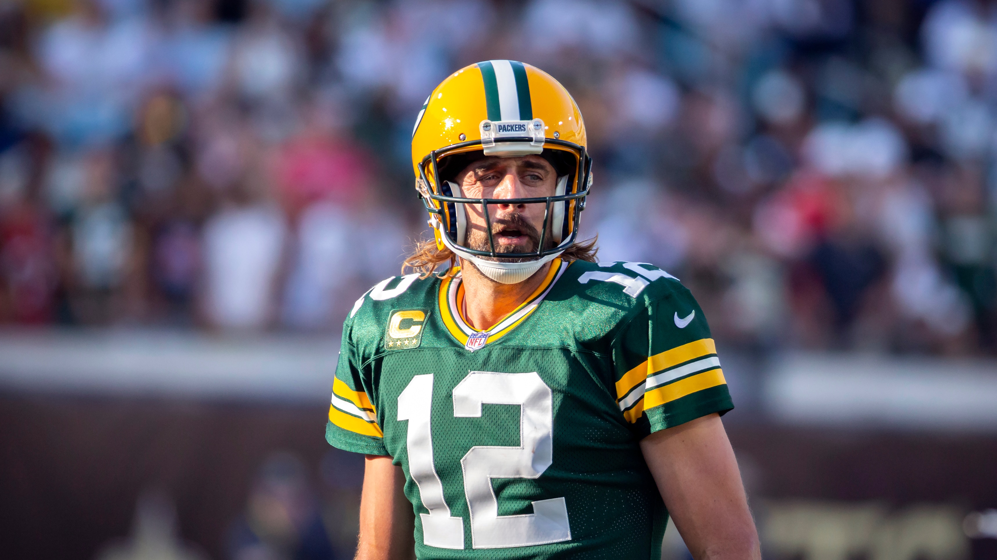 Green Bay Packers quarterback Aaron Rodgers (12) calls a play at the line of scrimmage during the second half of an NFL football game against the New Orleans Saints, Sunday, Sept. 12, 2021, in Jacksonville, Fla. (AP Photo/Stephen B. Morton)