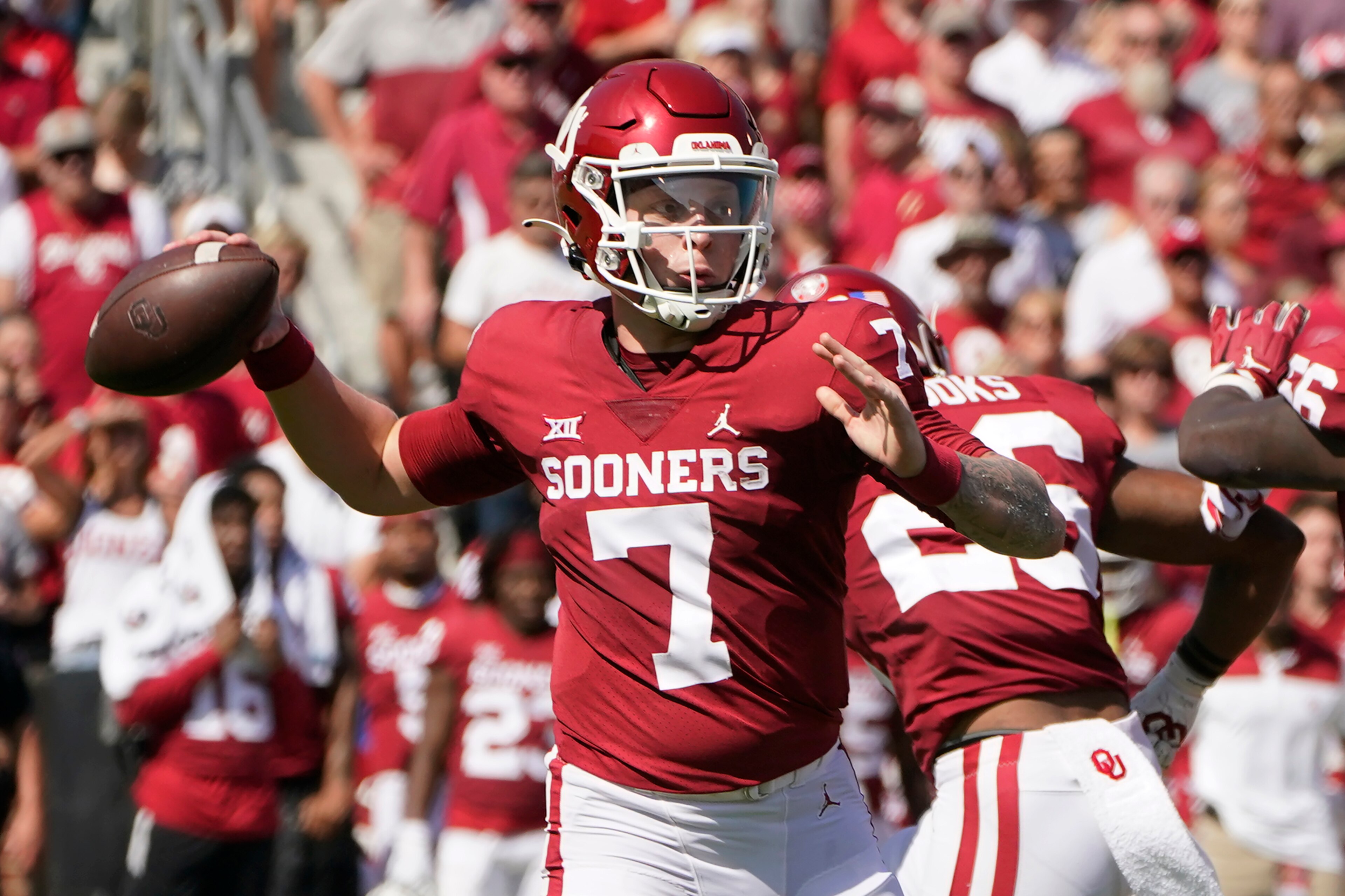 Oklahoma quarterback Spencer Rattler (7) throws in the first half of an NCAA college football game against Nebraska, Saturday, Sept. 18, 2021, in Norman, Okla. (AP Photo/Sue Ogrocki) Oklahoma quarterback Spencer Rattler (7) throws in the first half of an NCAA college football game against Nebraska, Saturday, Sept. 18, 2021, in Norman, Okla. (AP Photo/Sue Ogrocki)