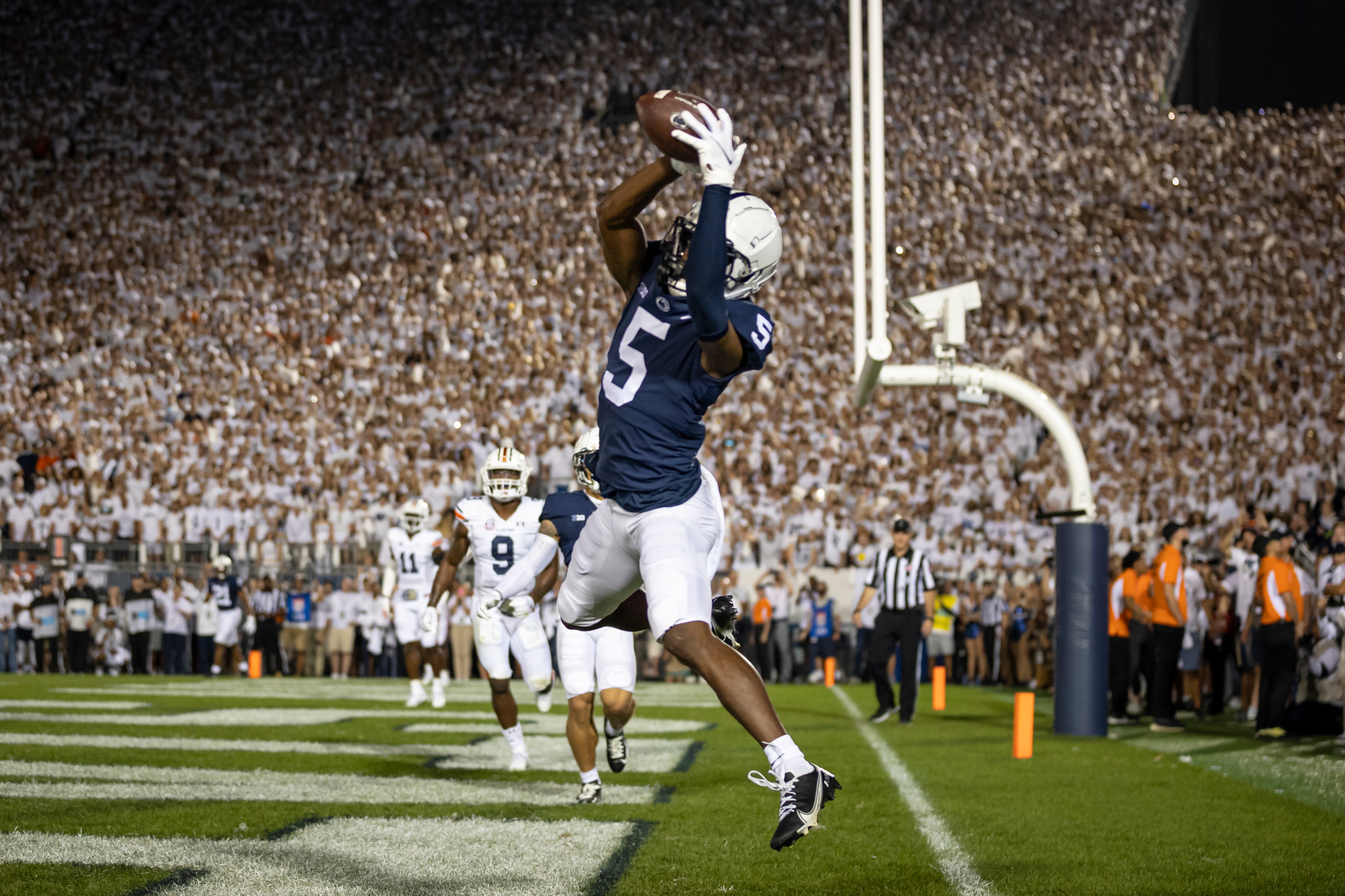 STATE COLLEGE, PA - SEPTEMBER 18: Jahan Dotson #5 of the Penn State Nittany Lions catches a pass for a touchdown against the Auburn Tigers during the first half at Beaver Stadium on September 18, 2021 in State College, Pennsylvania. (Photo by Scott Taetsch/Getty Images)