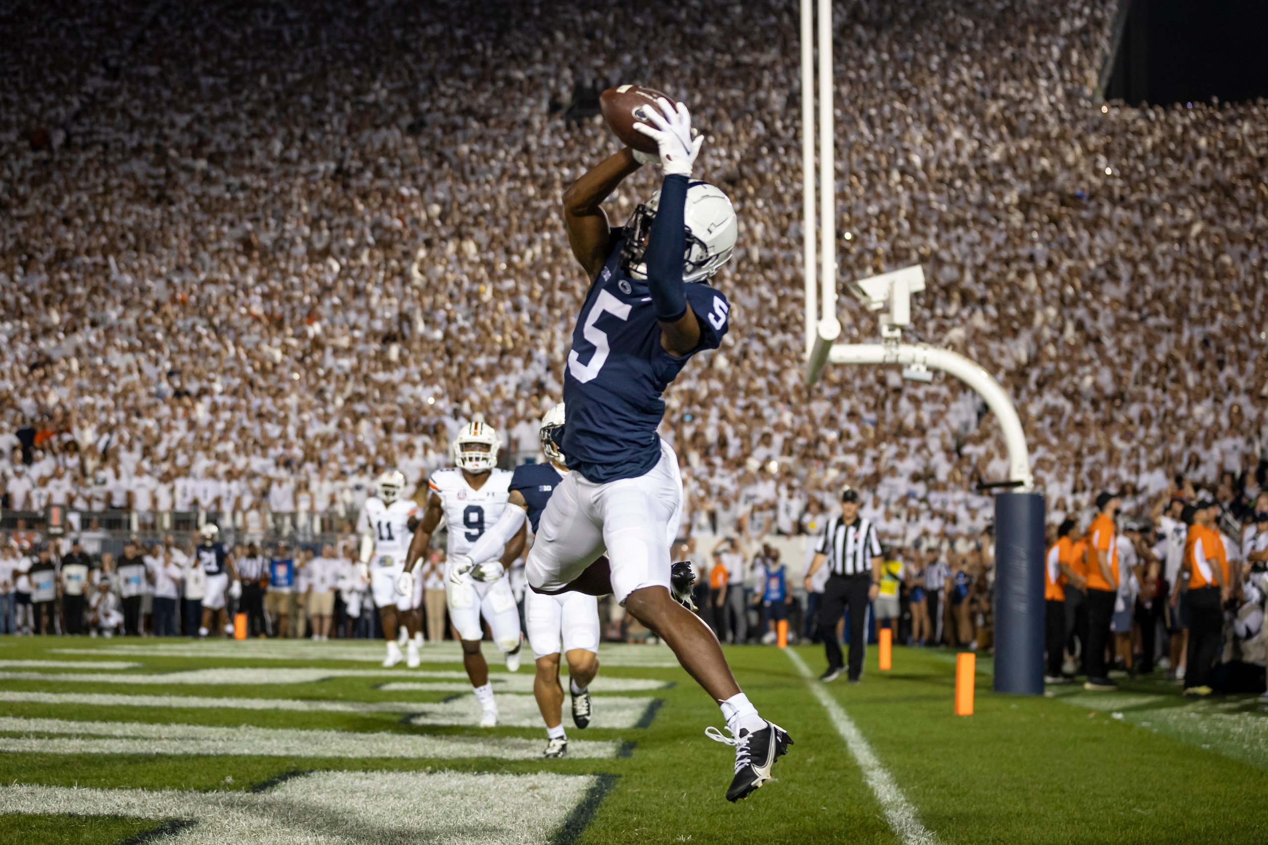 STATE COLLEGE, PA - SEPTEMBER 18: Jahan Dotson #5 of the Penn State Nittany Lions catches a pass for a touchdown against the Auburn Tigers during the first half at Beaver Stadium on September 18, 2021 in State College, Pennsylvania. (Photo by Scott Taetsch/Getty Images)