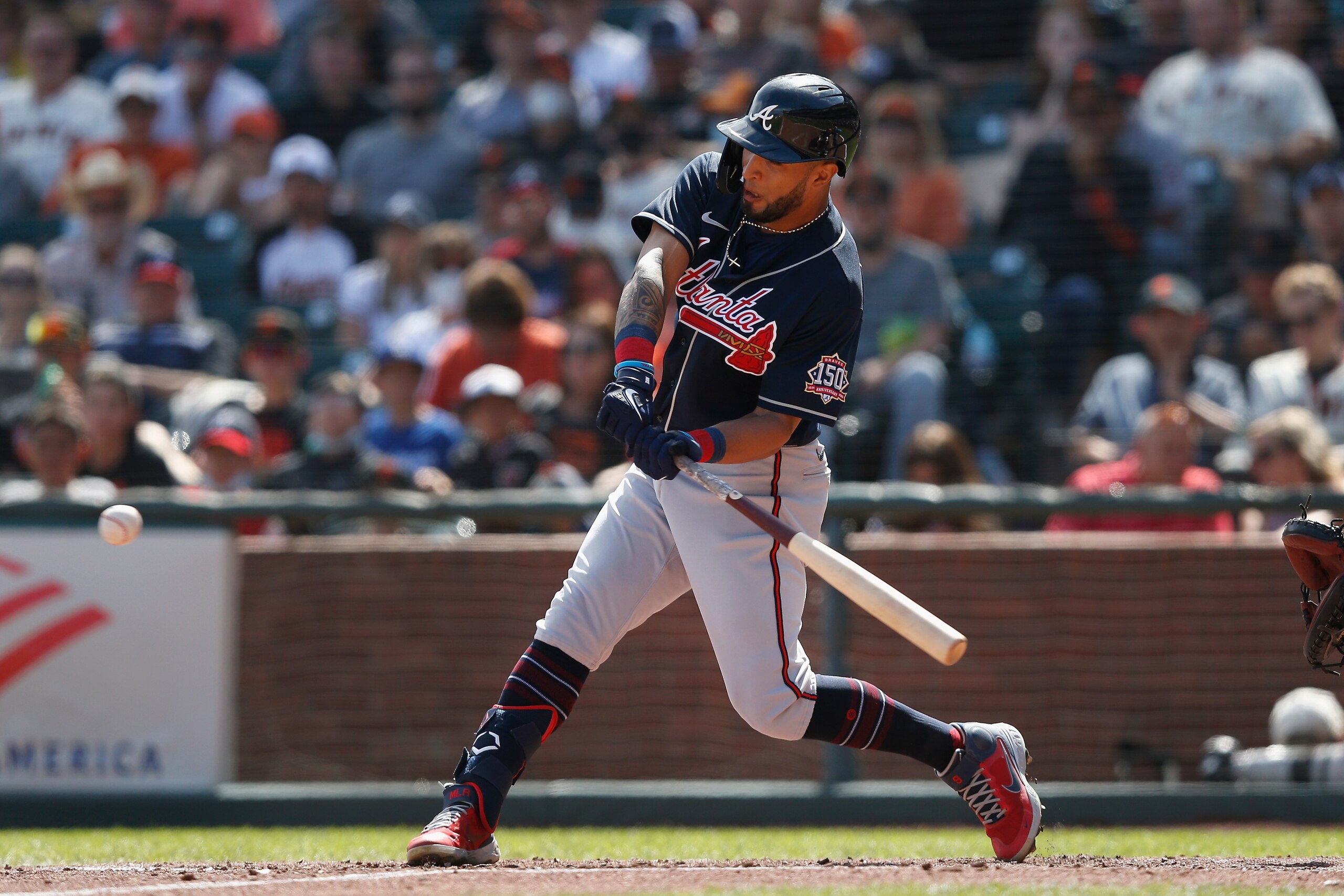 SAN FRANCISCO, CALIFORNIA - SEPTEMBER 19: Eddie Rosario #8 of the Atlanta Braves hits a triple in the top of the fifth inning against the San Francisco Giants at Oracle Park on September 19, 2021 in San Francisco, California. (Photo by Lachlan Cunningham/Getty Images)