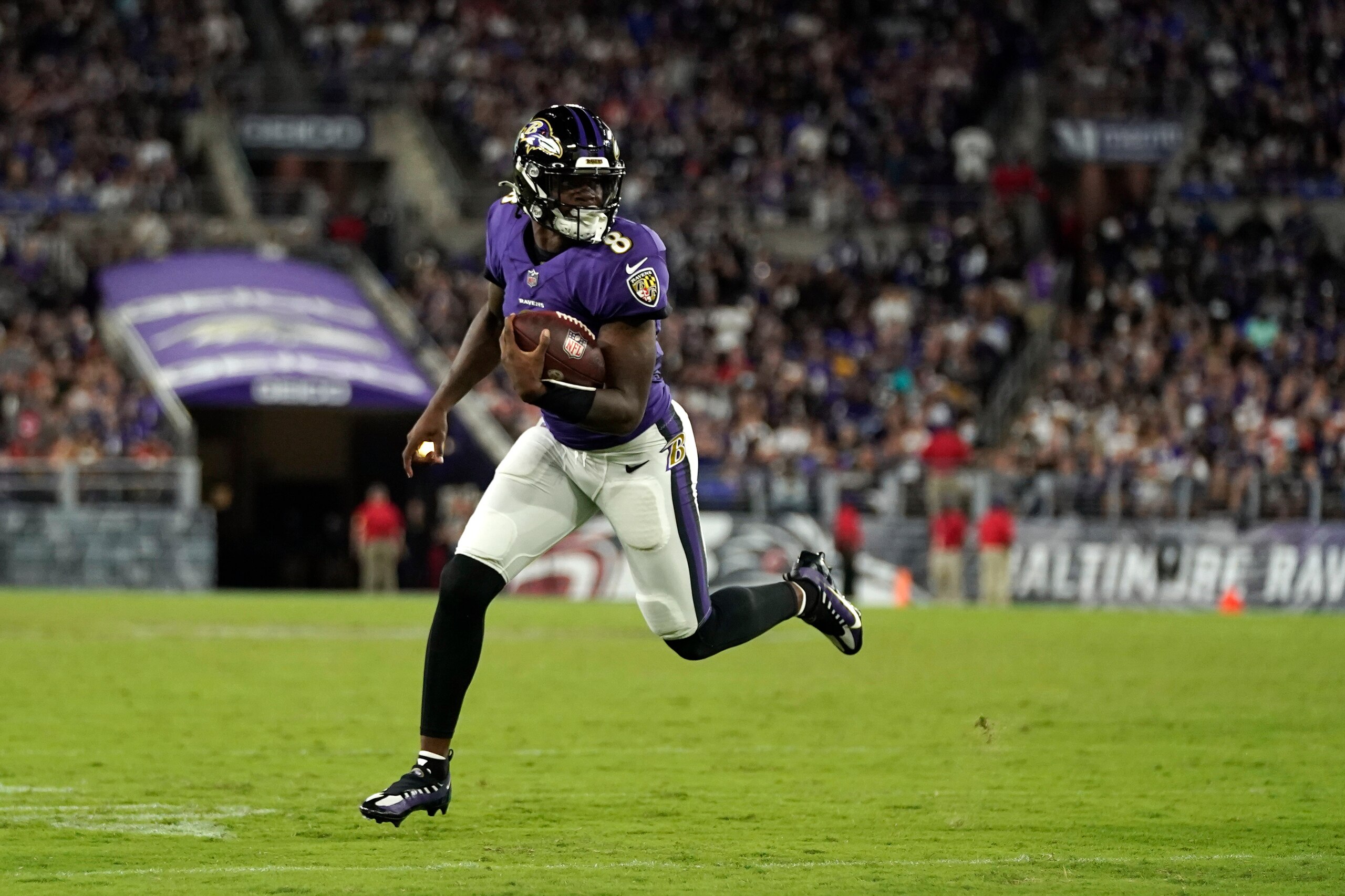 Baltimore Ravens quarterback Lamar Jackson rushes the ball in the second half of an NFL football game against the Kansas City Chiefs, Sunday, Sept. 19, 2021, in Baltimore. (AP Photo/Julio Cortez)