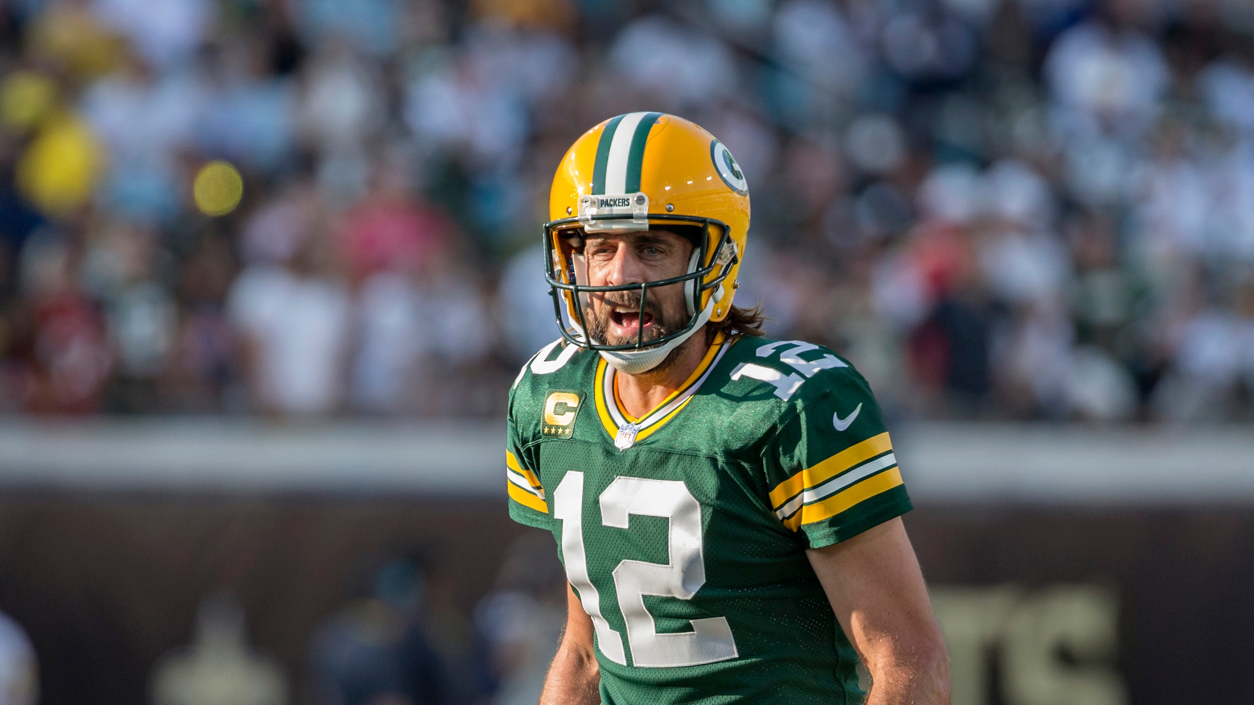 Green Bay Packers quarterback Aaron Rodgers (12) calls a play at the line of scrimmage during the second half of an NFL football game against the New Orleans Saints, Sunday, Sept. 12, 2021, in Jacksonville, Fla. (AP Photo/Stephen B. Morton)