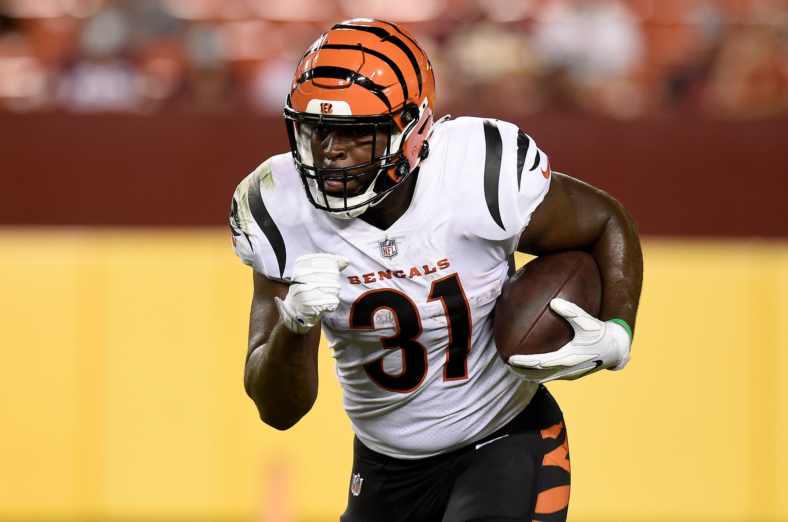 LANDOVER, MARYLAND - AUGUST 20: Jacques Patrick #31 of the Cincinnati Bengals rushes the ball during the NFL preseason game against the Washington Football Team at FedExField on August 20, 2021 in Landover, Maryland. (Photo by Greg Fiume/Getty Images)