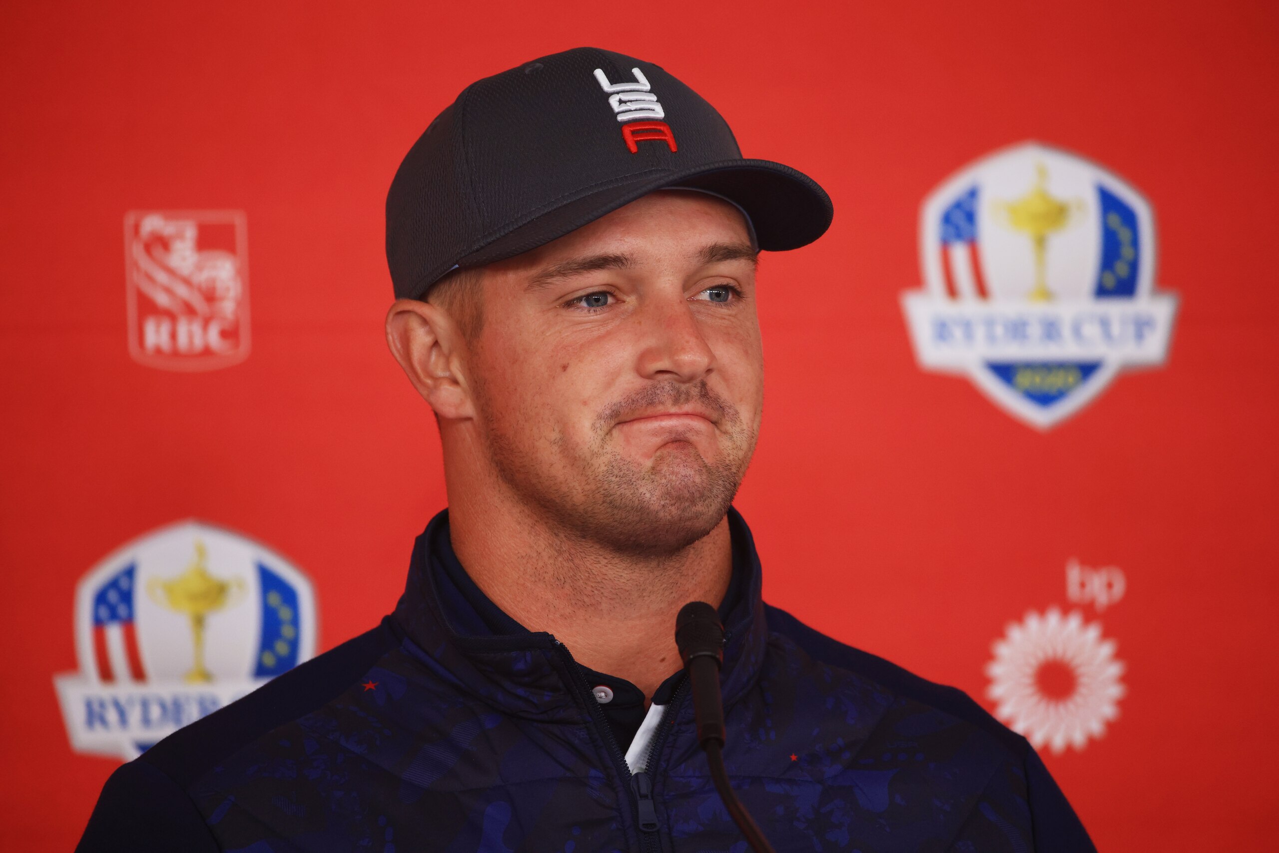 KOHLER, WISCONSIN - SEPTEMBER 21: Bryson DeChambeau of team United States speaks to the media prior to the 43rd Ryder Cup at Whistling Straits on September 21, 2021 in Kohler, Wisconsin. (Photo by Mike Ehrmann/Getty Images) KOHLER, WISCONSIN - SEPTEMBER 21: Bryson DeChambeau of team United States speaks to the media prior to the 43rd Ryder Cup at Whistling Straits on September 21, 2021 in Kohler, Wisconsin. (Photo by Mike Ehrmann/Getty Images)