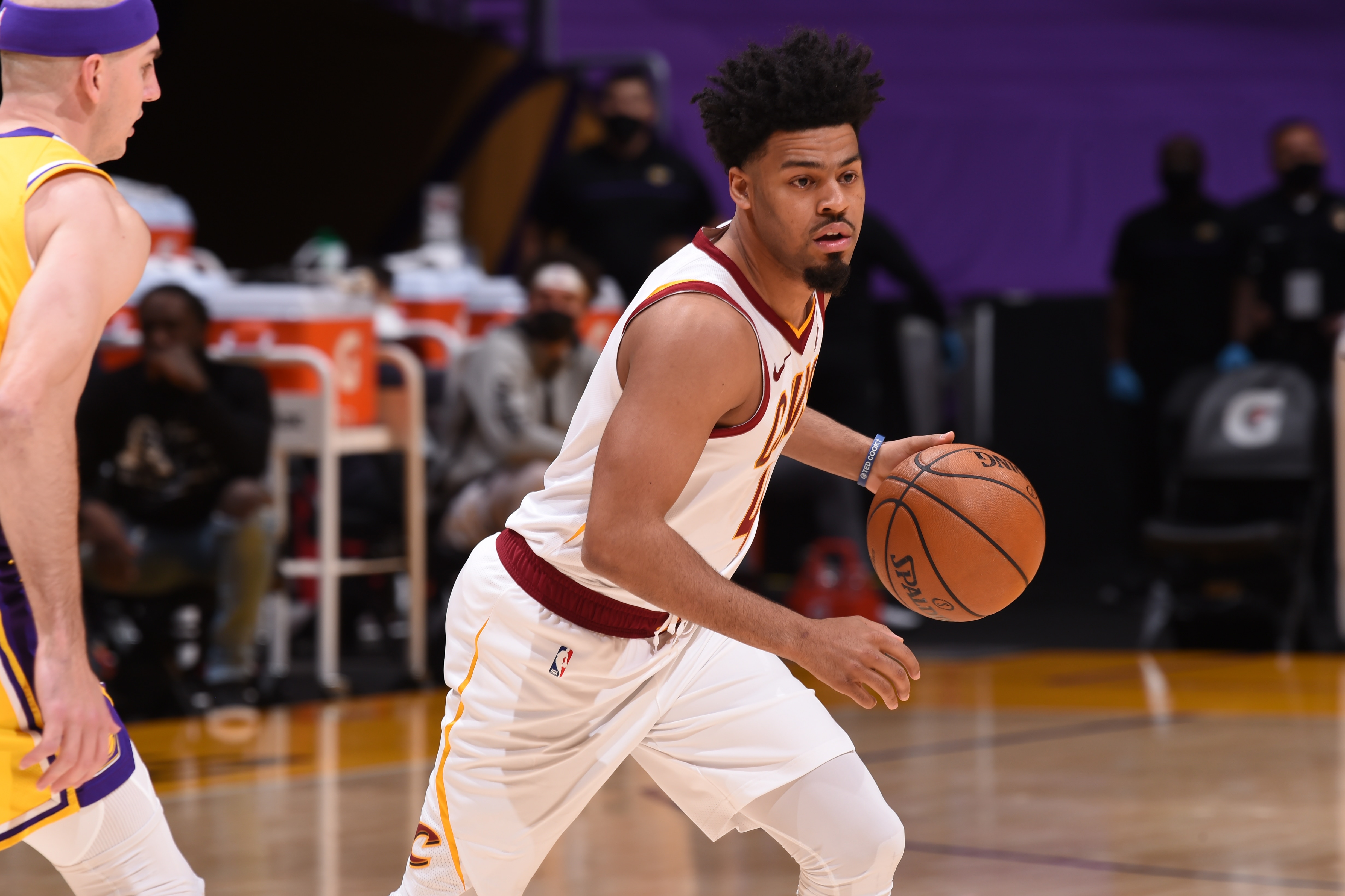 LOS ANGELES, CA - MARCH 26: Quinn Cook #4 of the Cleveland Cavaliers handles the ball against the Los Angeles Lakers on March 26, 2021 at STAPLES Center in Los Angeles, California. NOTE TO USER: User expressly acknowledges and agrees that, by downloading and/or using this Photograph, user is consenting to the terms and conditions of the Getty Images License Agreement. Mandatory Copyright Notice: Copyright 2021 NBAE (Photo by Juan Ocampo/NBAE via Getty Images)