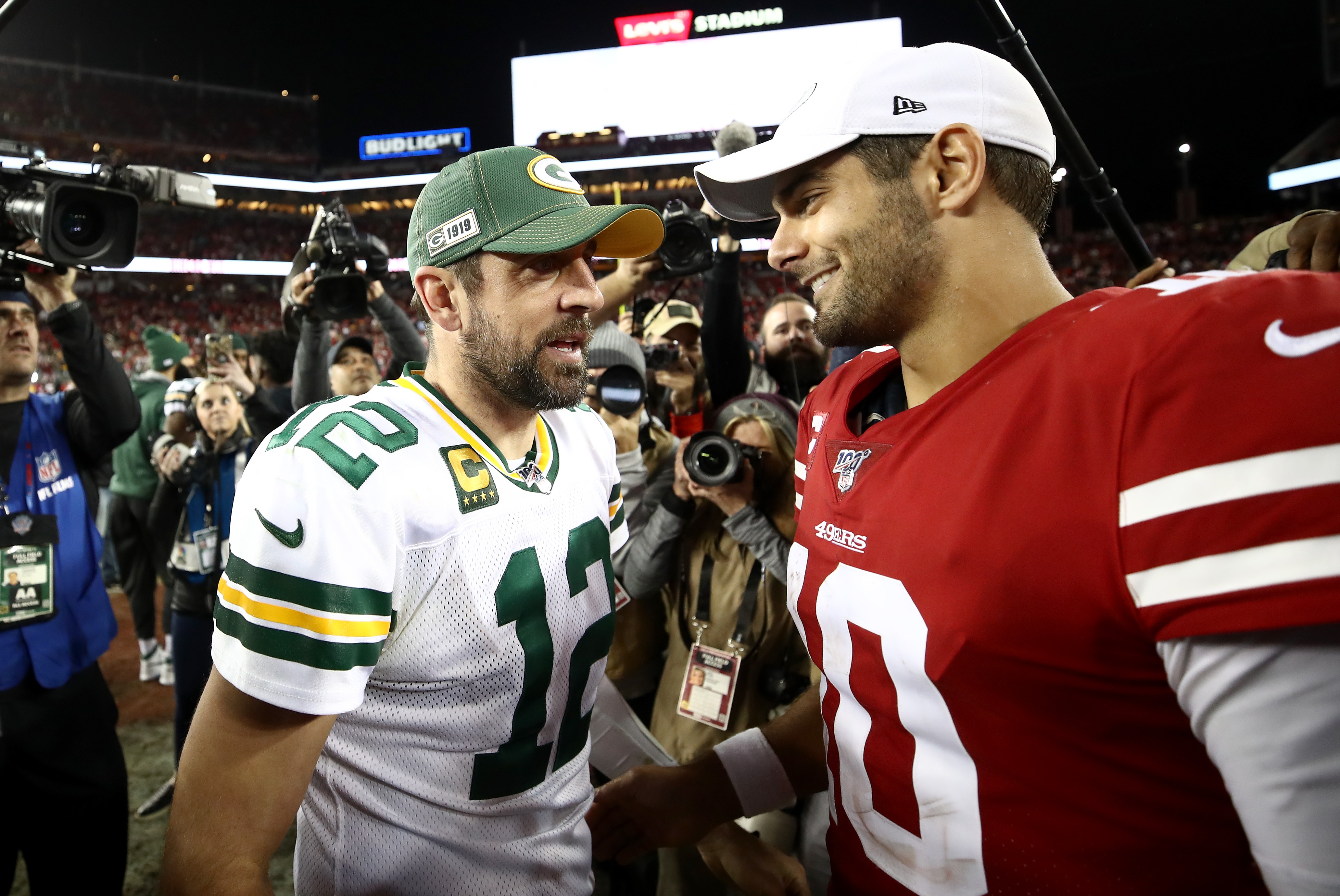 SANTA CLARA, CALIFORNIA - NOVEMBER 24:  Aaron Rodgers #12 of the Green Bay Packers shakes hands with Jimmy Garoppolo #10 of the San Francisco 49ers after their game at Levi's Stadium on November 24, 2019 in Santa Clara, California. (Photo by Ezra Shaw/Getty Images)