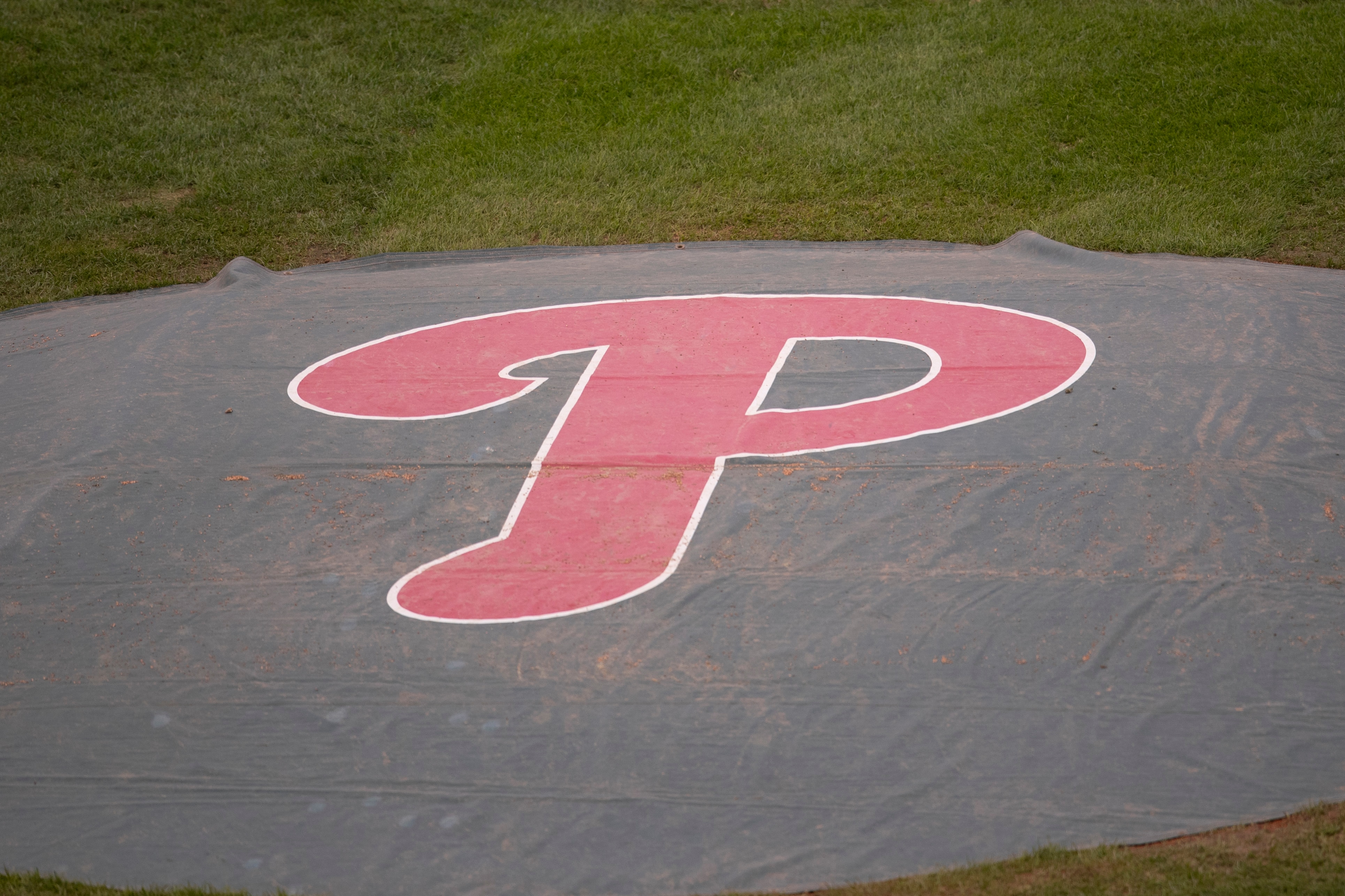 PHILADELPHIA, PA - SEPTEMBER 02: A detail view of the tarp covering the pitchers mound with Philadelphia Phillies logo prior to the game against the Washington Nationals at Citizens Bank Park on September 2, 2020 in Philadelphia, Pennsylvania. The Phillies defeated the Nationals 3-0. (Photo by Mitchell Leff/Getty Images)